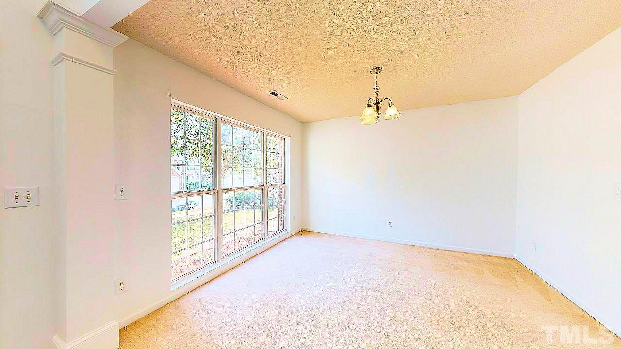 2901 Tuckland Drive Raleigh, NC 27610 - Photo 3 of 28 a view of a room with a window