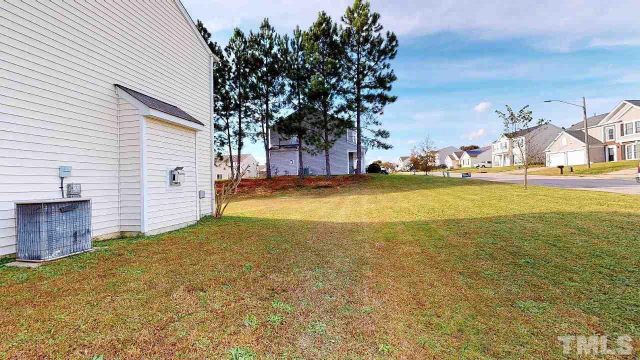 2901 Tuckland Drive Raleigh, NC 27610 - Photo 26 of 28 a view of a house with pool and ocean view