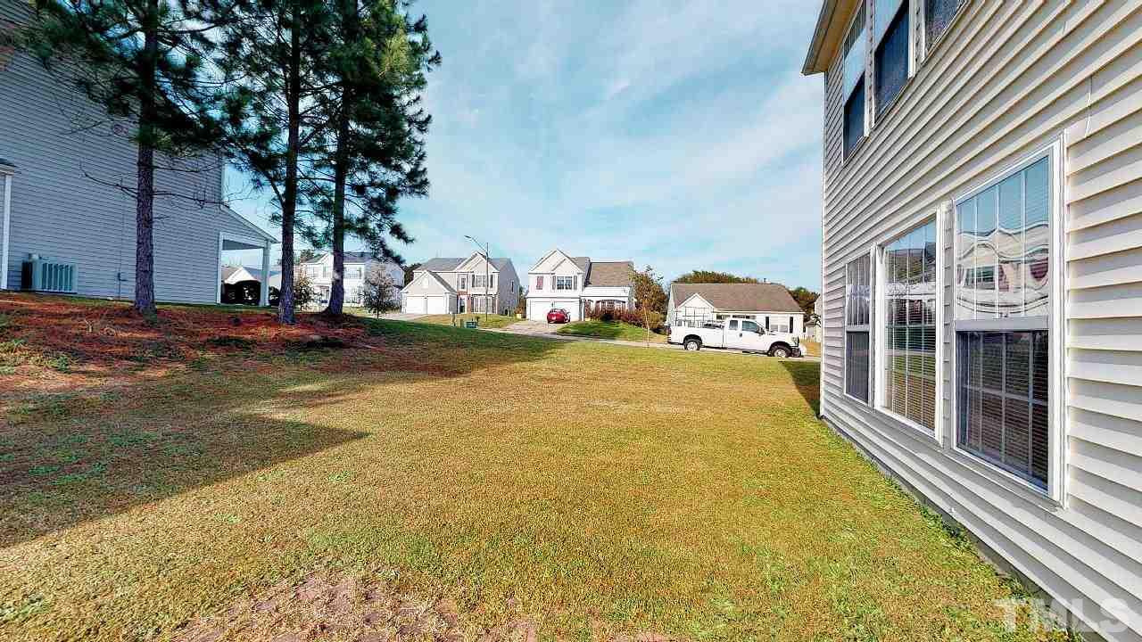 2901 Tuckland Drive Raleigh, NC 27610 - Photo 27 of 28 a view of an outdoor space and swimming pool