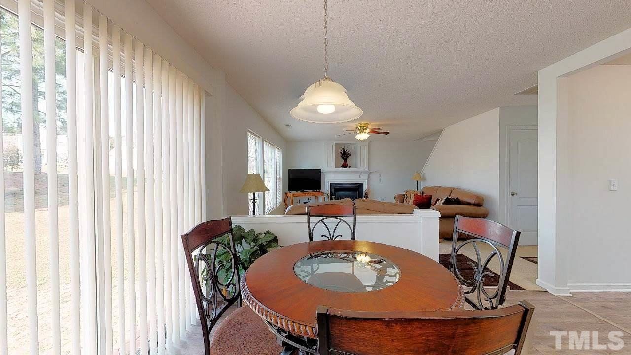 2901 Tuckland Drive Raleigh, NC 27610 - Photo 8 of 28 a dining room with furniture and window