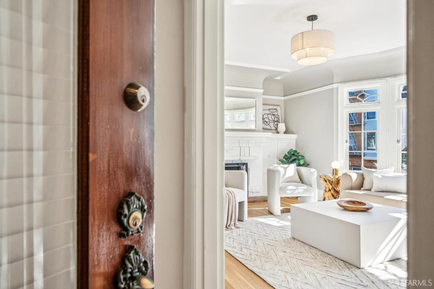 2522 Chestnut Street San Francisco, CA 94123 - Photo 2 of 34 a living room with furniture and a window