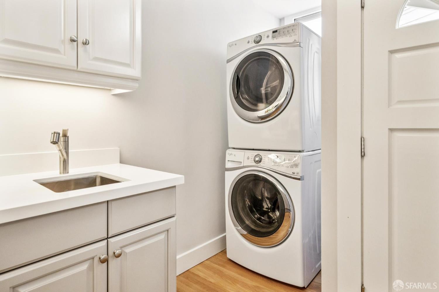2522 Chestnut Street San Francisco, CA 94123 - Photo 21 of 34 a utility room with sink dryer and washer