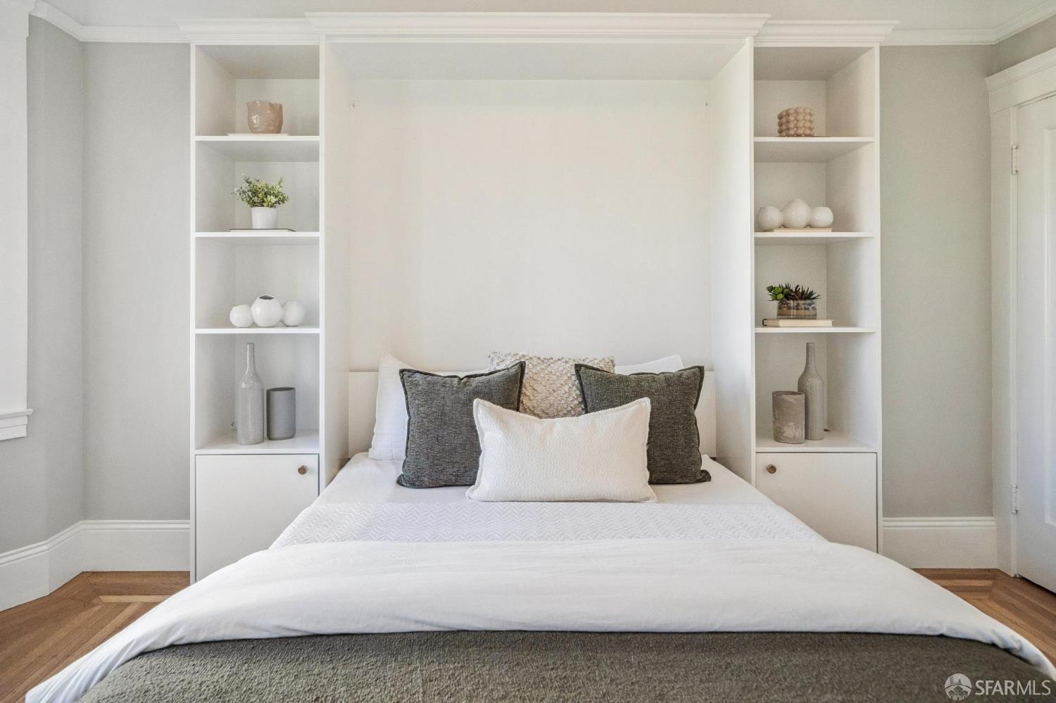 2522 Chestnut Street San Francisco, CA 94123 - Photo 28 of 34 a bedroom with a bed and closet