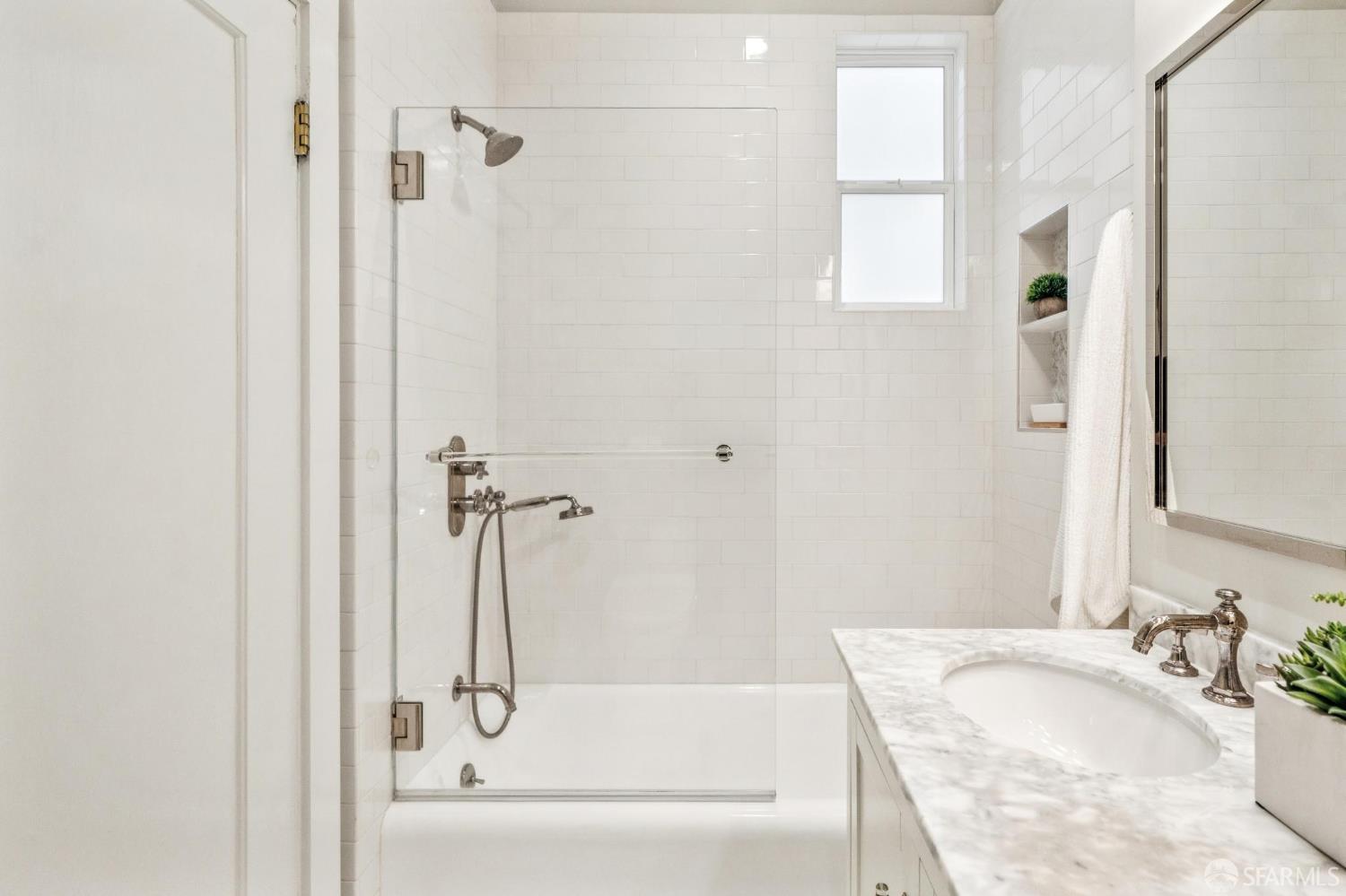 2522 Chestnut Street San Francisco, CA 94123 - Photo 30 of 34 a bathroom with a tub sink