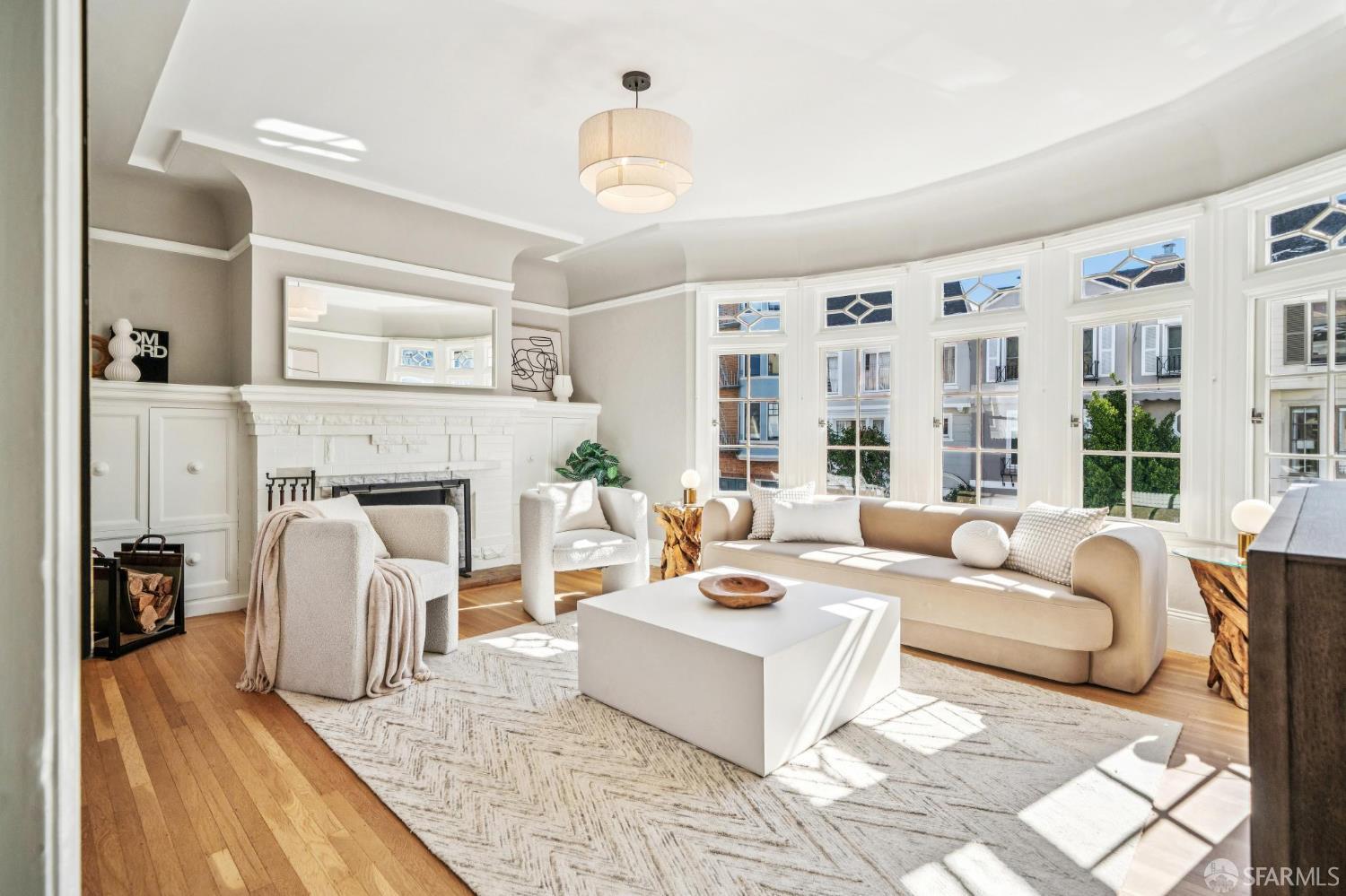 2522 Chestnut Street San Francisco, CA 94123 - Photo 4 of 34 a living room with furniture fireplace and a large window