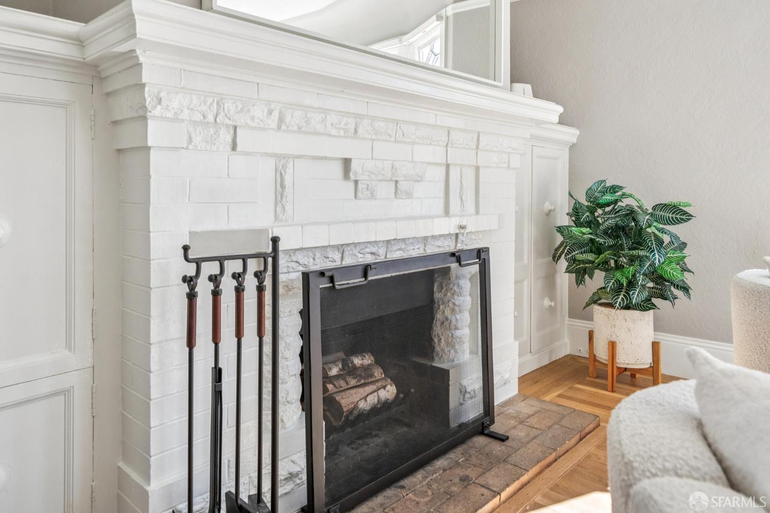 2522 Chestnut Street San Francisco, CA 94123 - Photo 6 of 34 a living room with furniture and a fireplace
