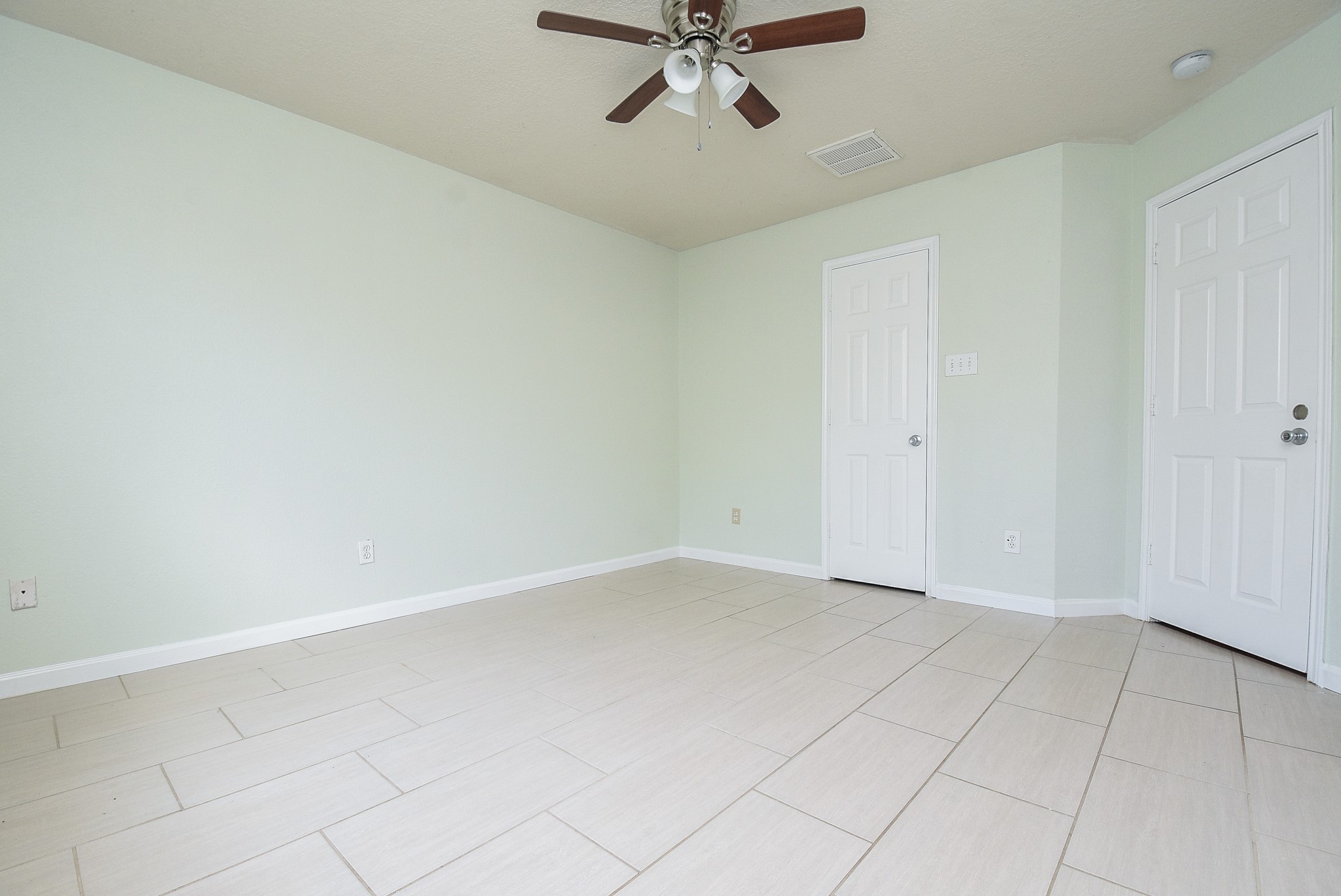 29323 Hickory Terrace Drive Spring, TX 77386 - Photo 18 of 32 Modern white tile adorn the floors