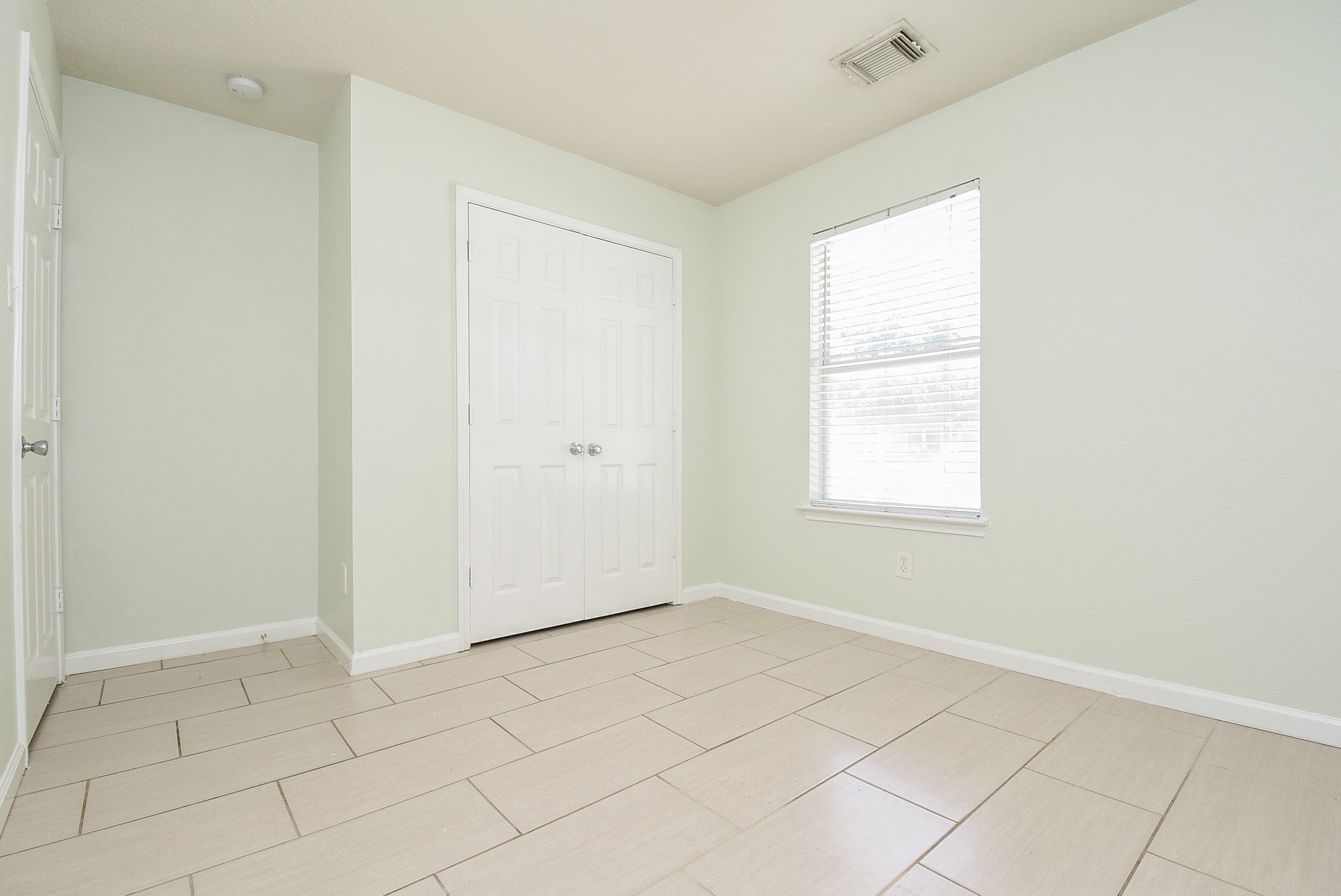 29323 Hickory Terrace Drive Spring, TX 77386 - Photo 26 of 32 Double doors gives way to closet