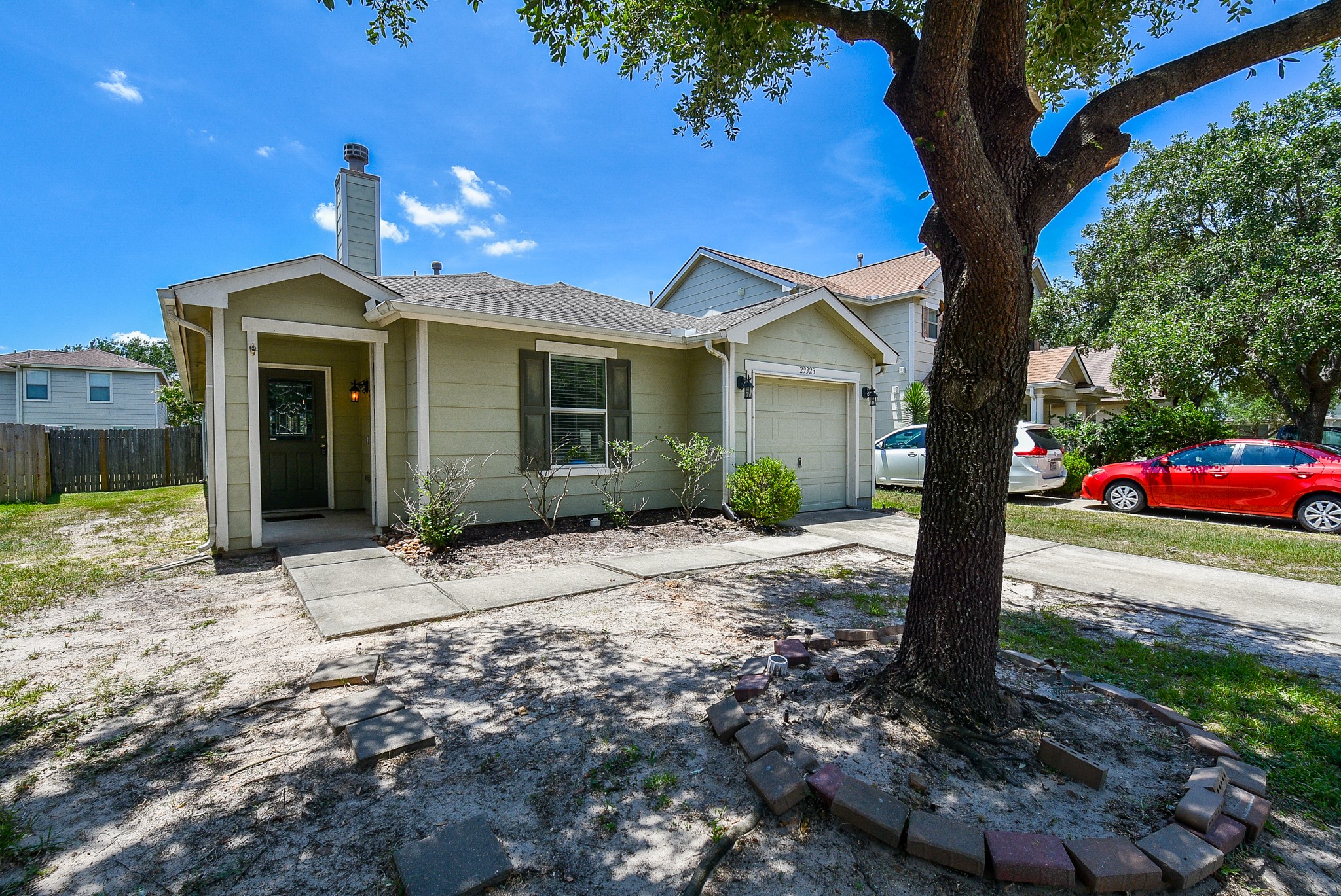 29323 Hickory Terrace Drive Spring, TX 77386 - Photo 3 of 32 Gorgeous tree offers plenty of shade year round