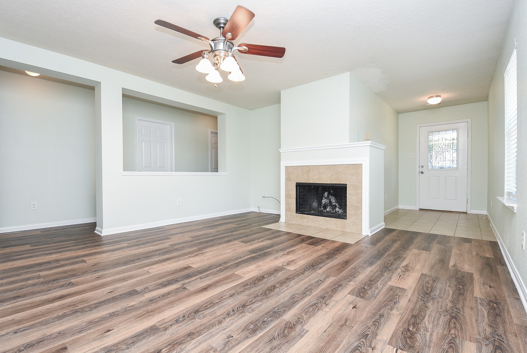 29323 Hickory Terrace Drive Spring, TX 77386 - Photo 5 of 32 Beautiful hardwood floors make up the living spaces.