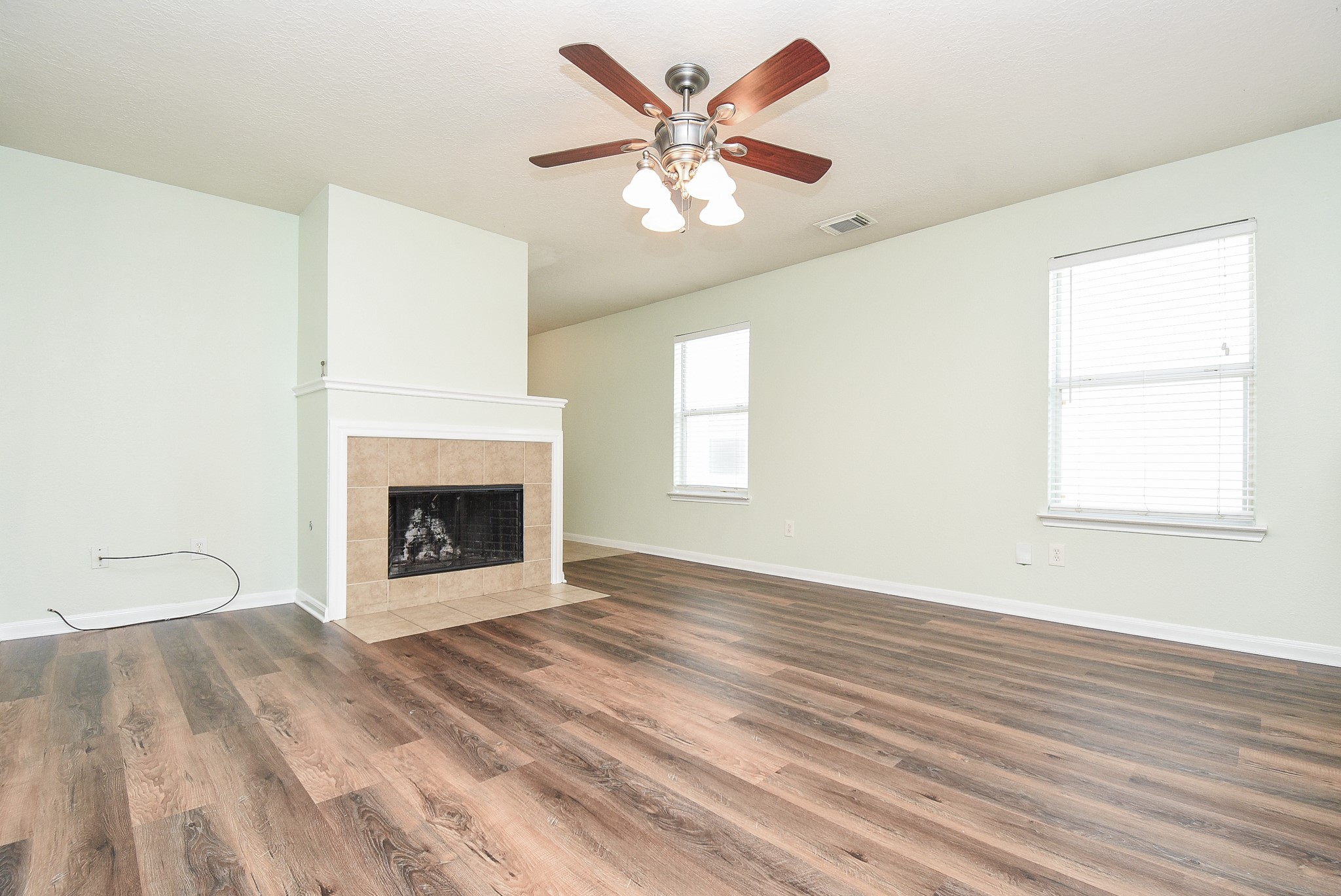 29323 Hickory Terrace Drive Spring, TX 77386 - Photo 8 of 32 Enjoy the chimney in the cold winter months to keep warm
