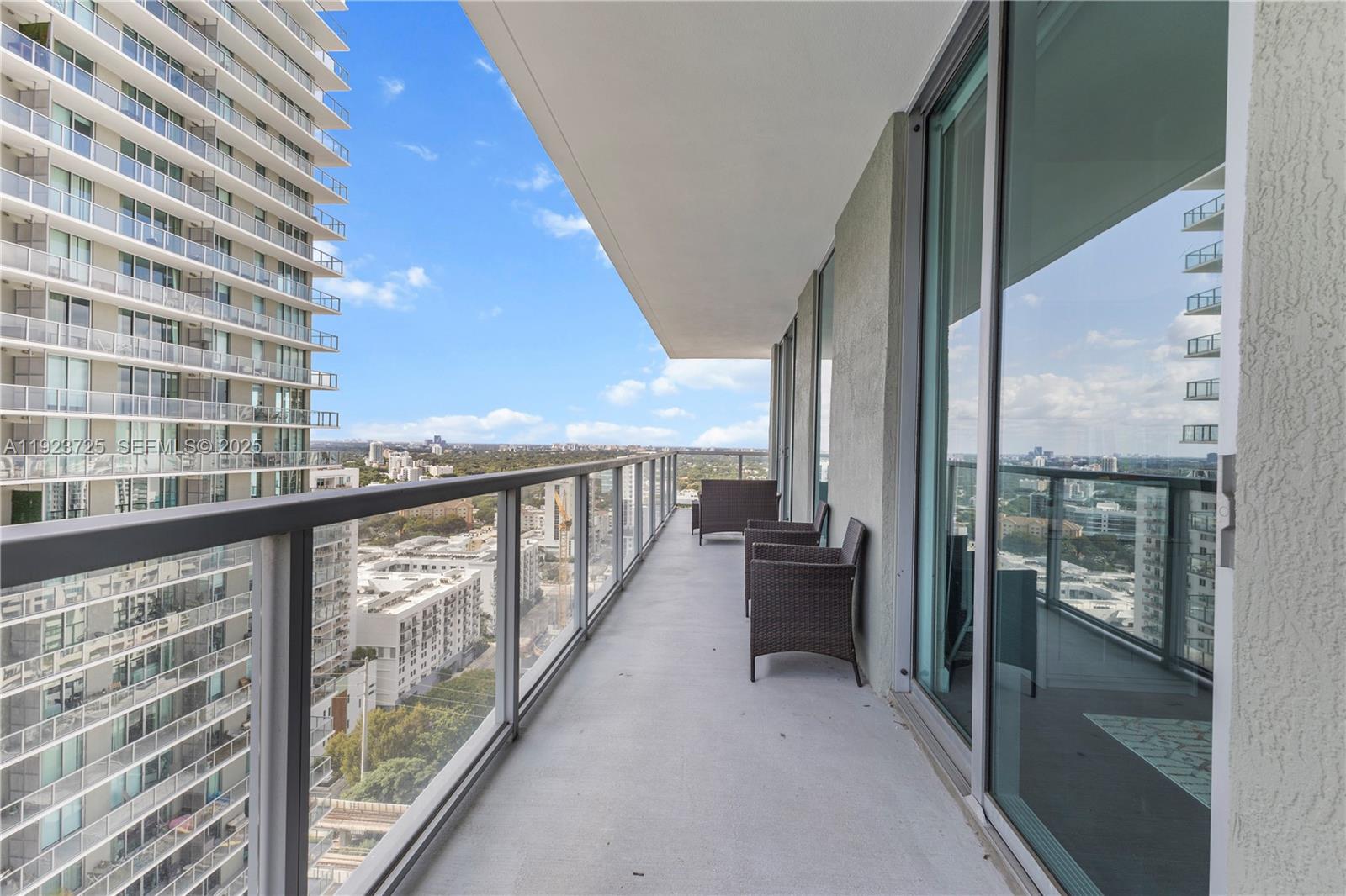 1111 Southwest 1st Avenue, Unit 2614N Miami, FL 33130 - Photo 16 of 32 a view of balcony with couch