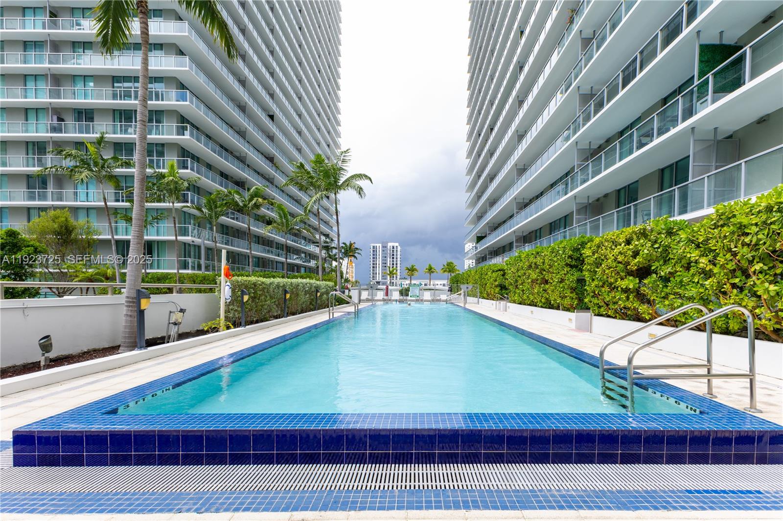 1111 Southwest 1st Avenue, Unit 2614N Miami, FL 33130 - Photo 20 of 32 a view of balcony with two chairs and a table
