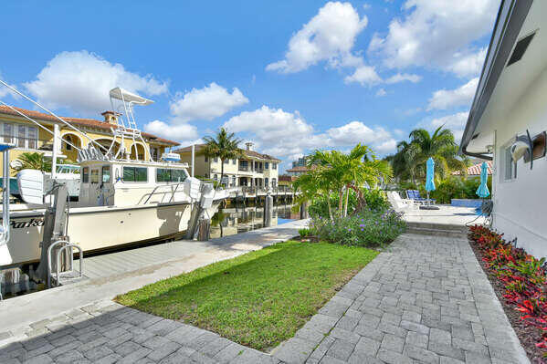 839 Enfield Street Boca Raton, FL 33487 - Photo 20 of 36 a view of a swimming pool with a patio