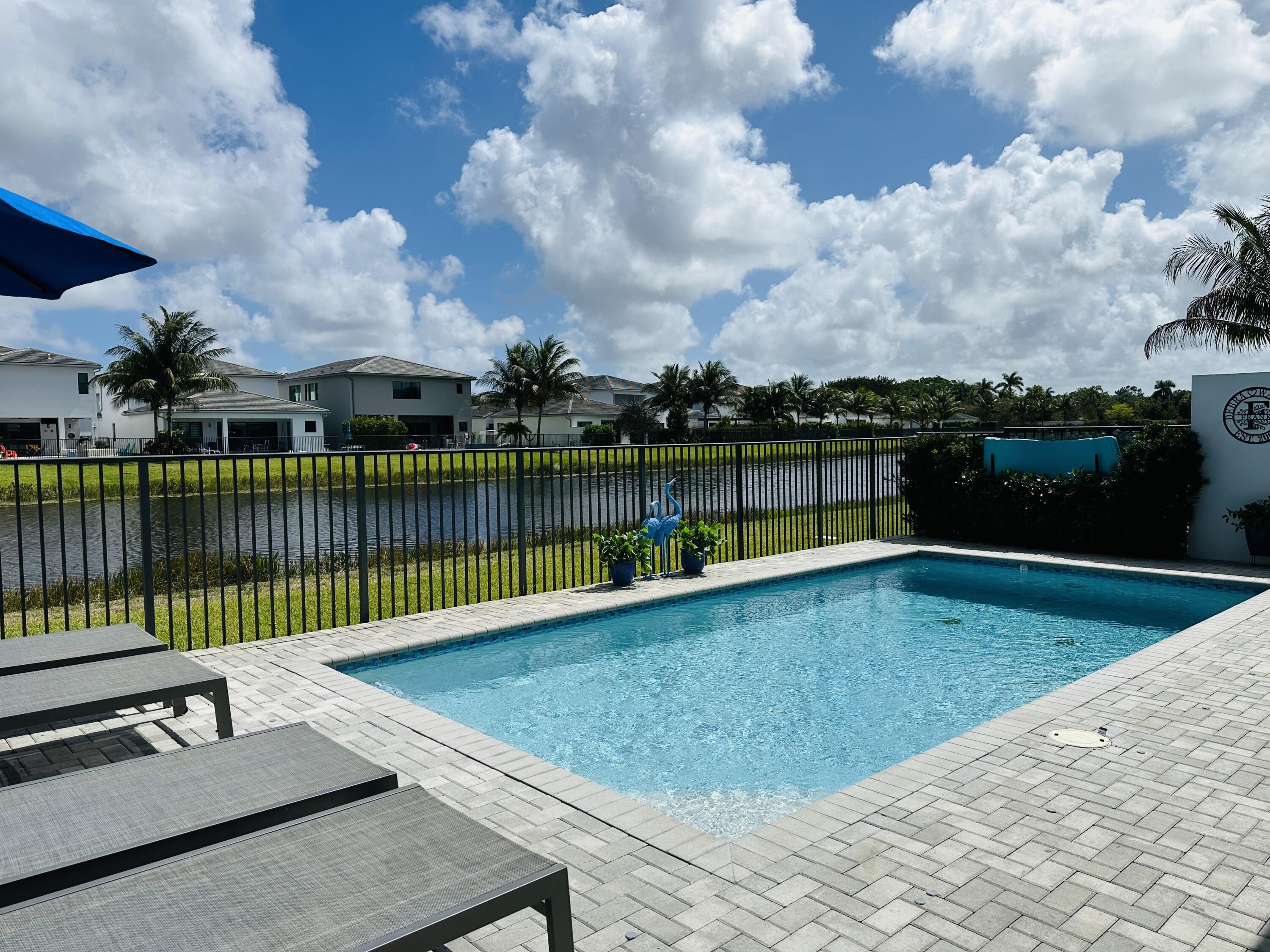 8537 Apple Falls Lane Boca Raton, FL 33496 - Photo 2 of 58 POOL & LAKE