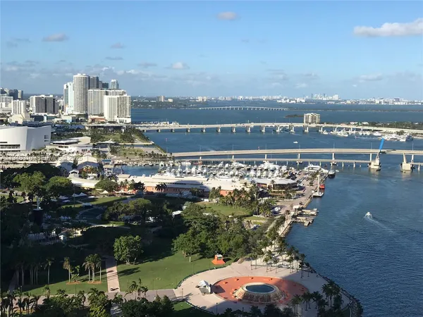 a view of a city with tall buildings
