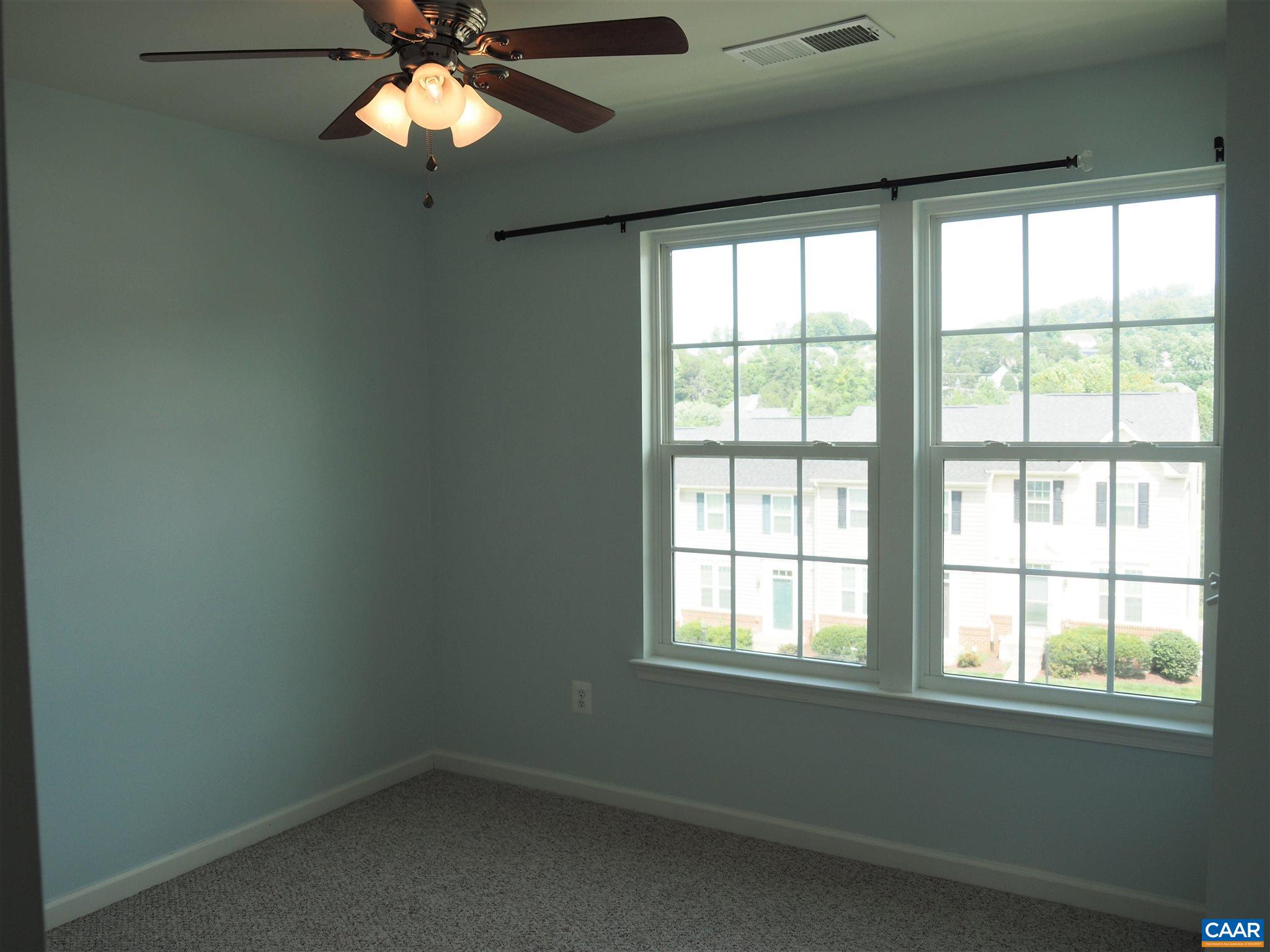 469 Rolkin Road Charlottesville, VA 22911 - Photo 25 of 38 an empty room with a window