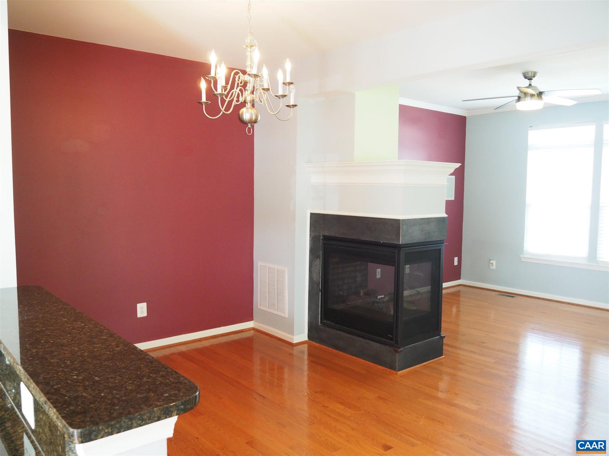 469 Rolkin Road Charlottesville, VA 22911 - Photo 8 of 38 a living room with furniture and a fireplace