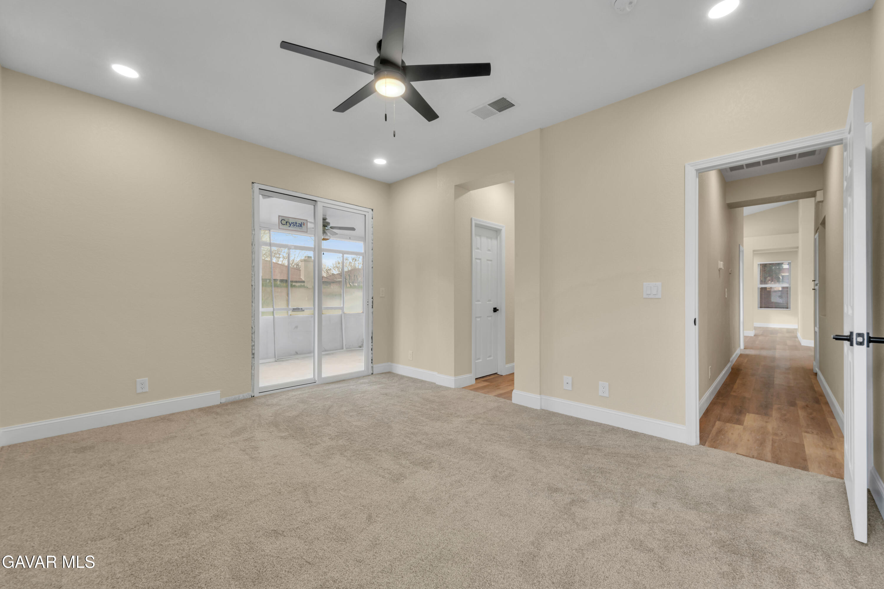 43323 Honeybee Lane Lancaster, CA 93536 - Photo 11 of 32 an empty room with fan and entrance