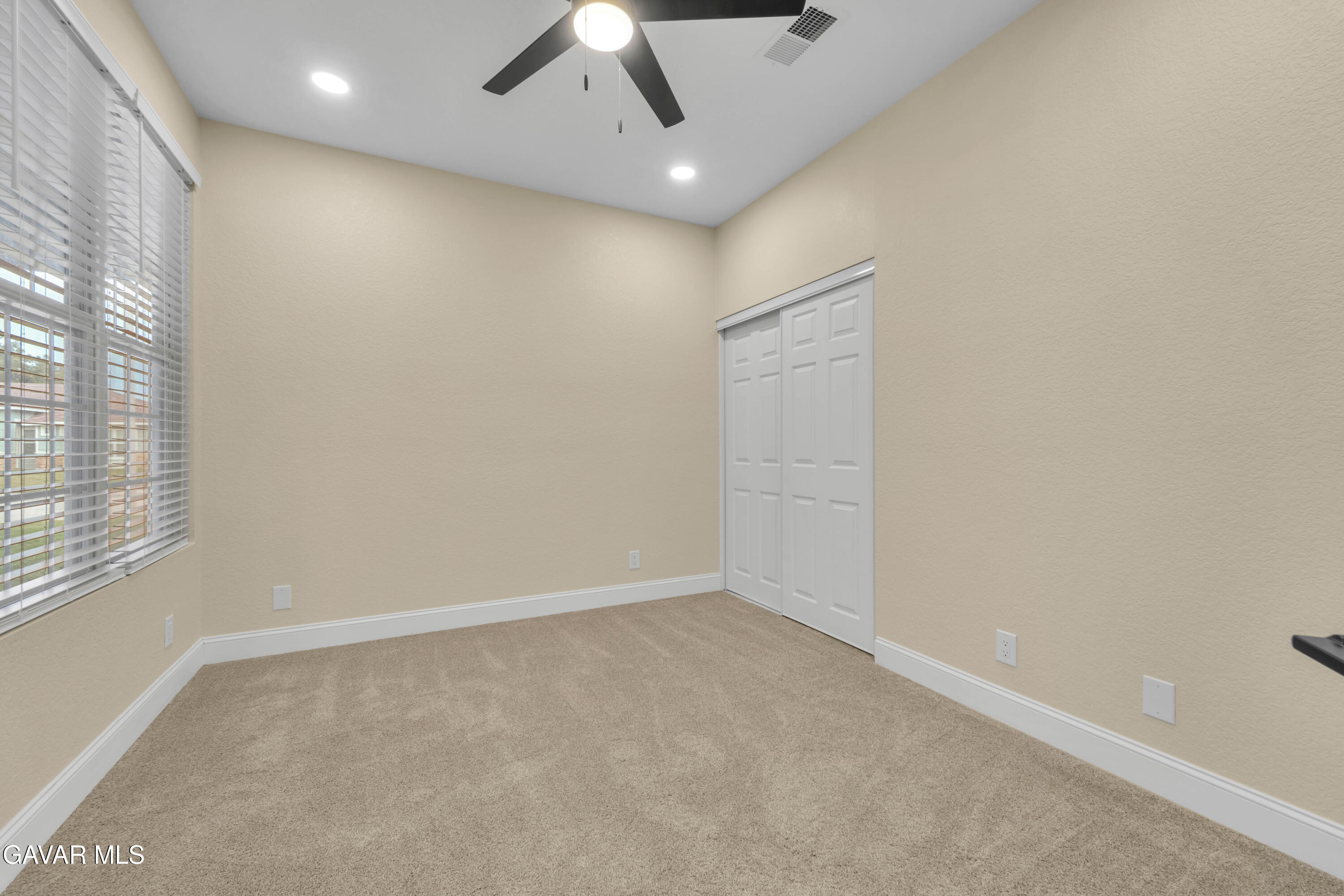 43323 Honeybee Lane Lancaster, CA 93536 - Photo 17 of 32 an empty room with a empty space and windows