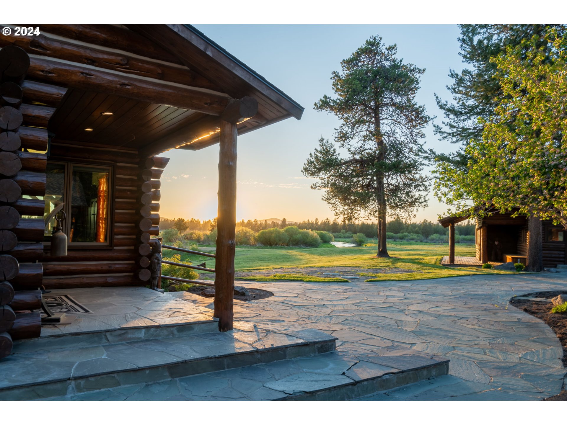 52255 Huntington Road La Pine, OR 97739 - Photo 20 of 48 a view of swimming pool with lawn chairs and plants