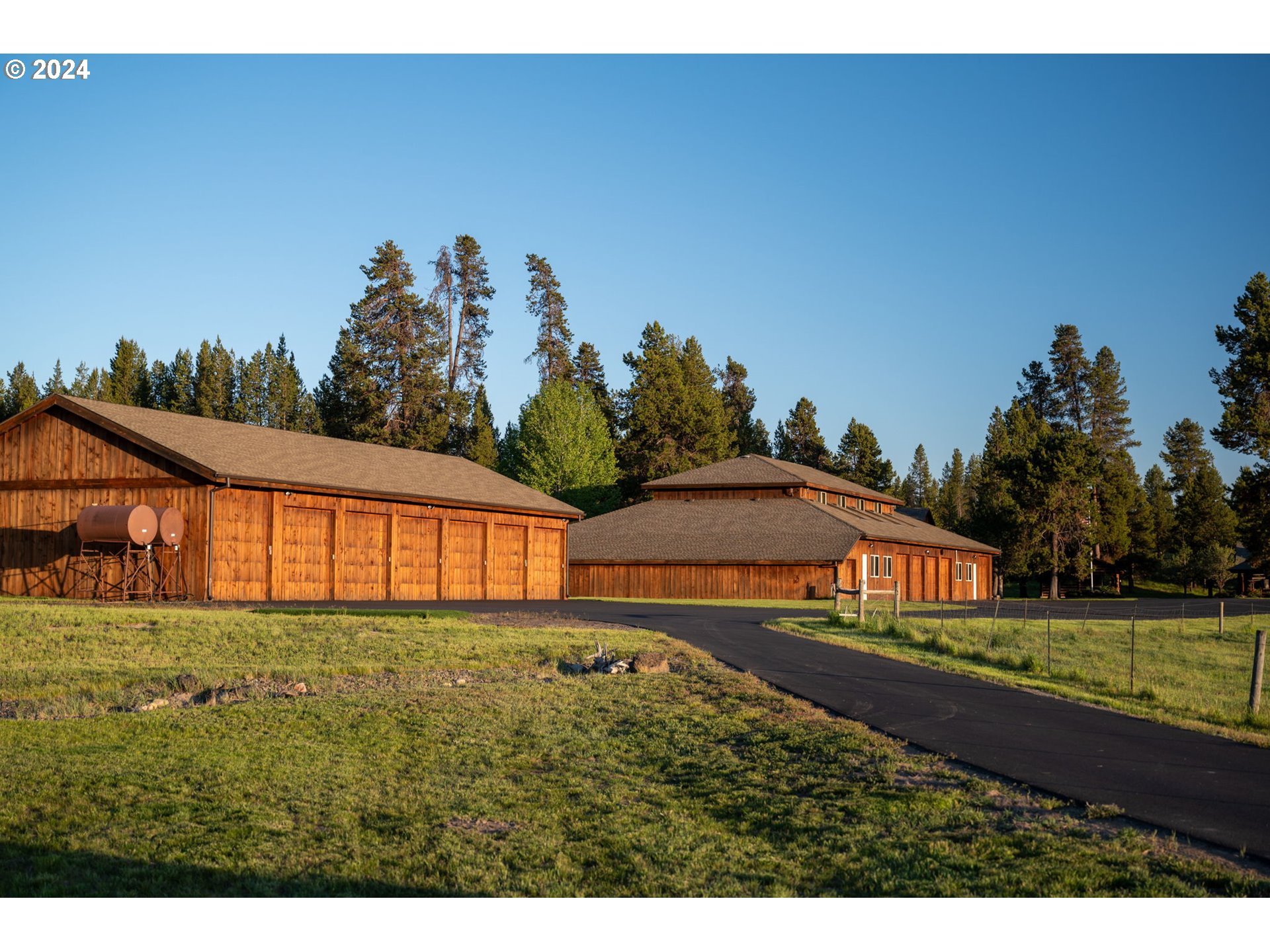 52255 Huntington Road La Pine, OR 97739 - Photo 24 of 48 a view of front of house with a yard
