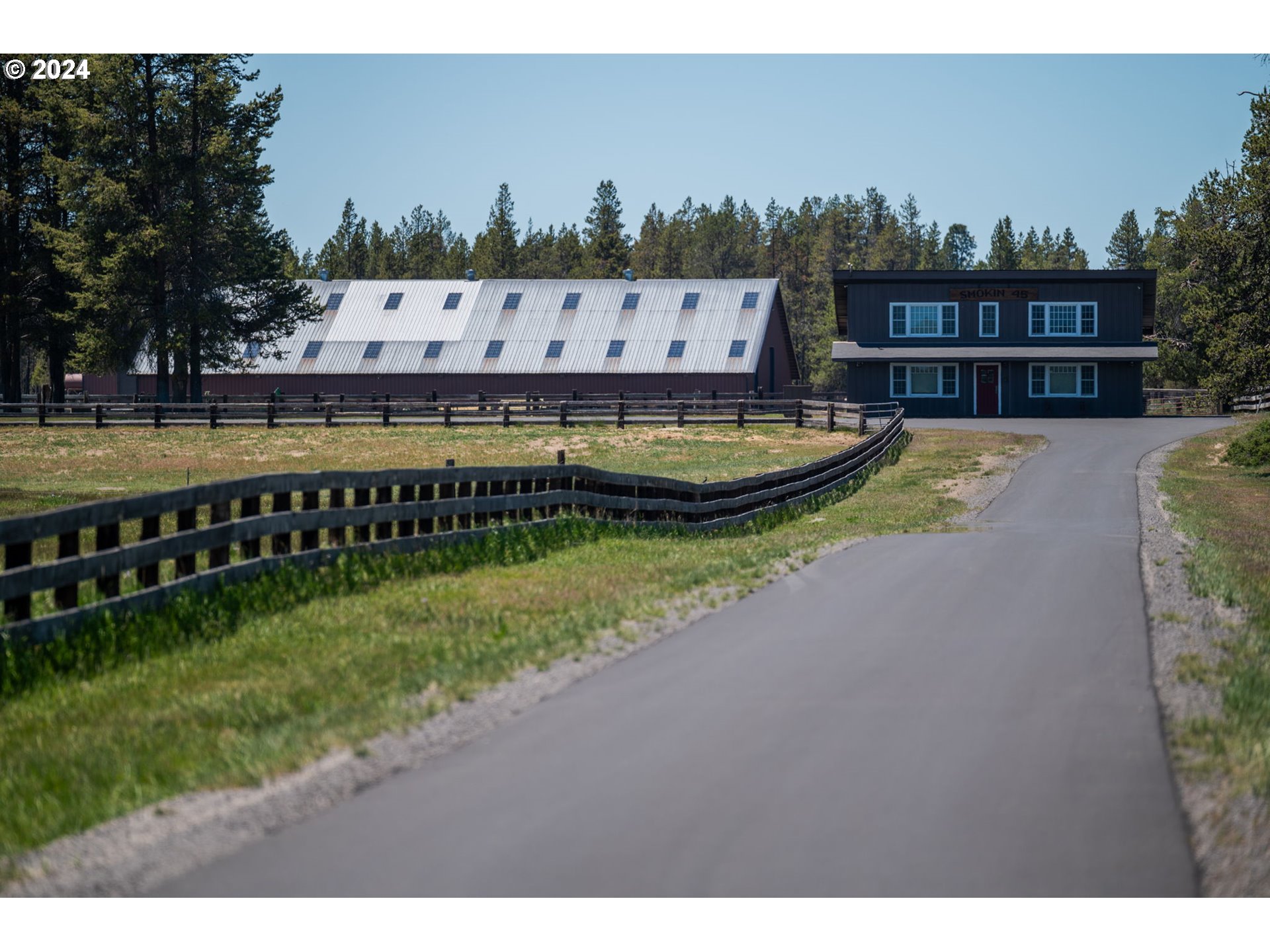 52255 Huntington Road La Pine, OR 97739 - Photo 32 of 48 a view of a swimming pool with a garden