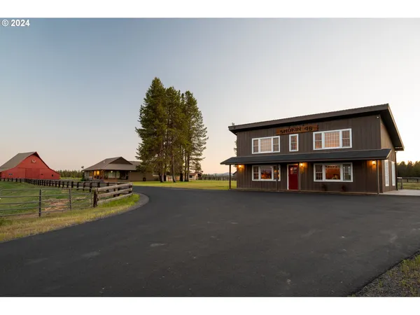 a black and white building with windows