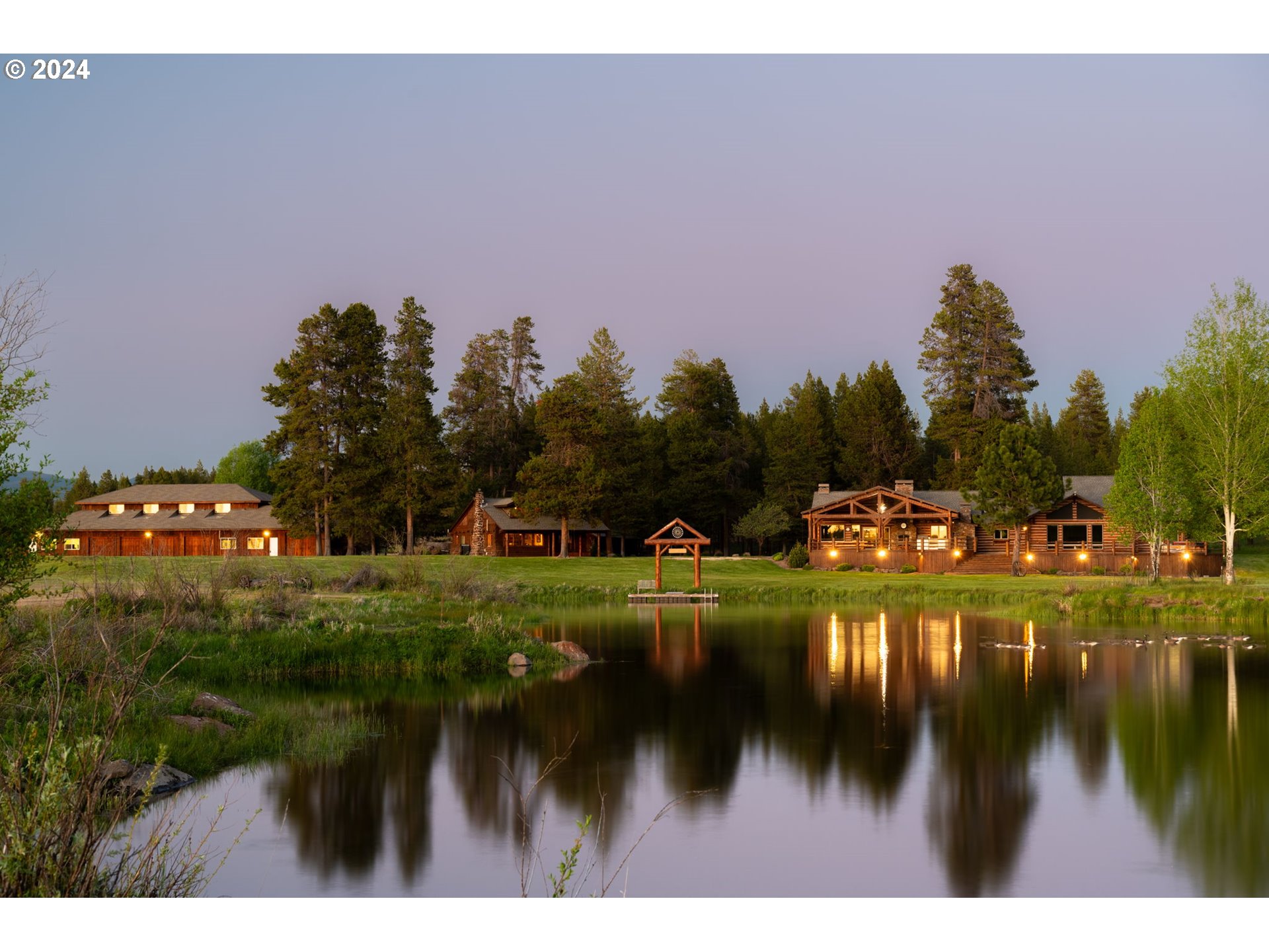 52255 Huntington Road La Pine, OR 97739 - Photo 4 of 48 a backyard of a house with a yard and outdoor seating