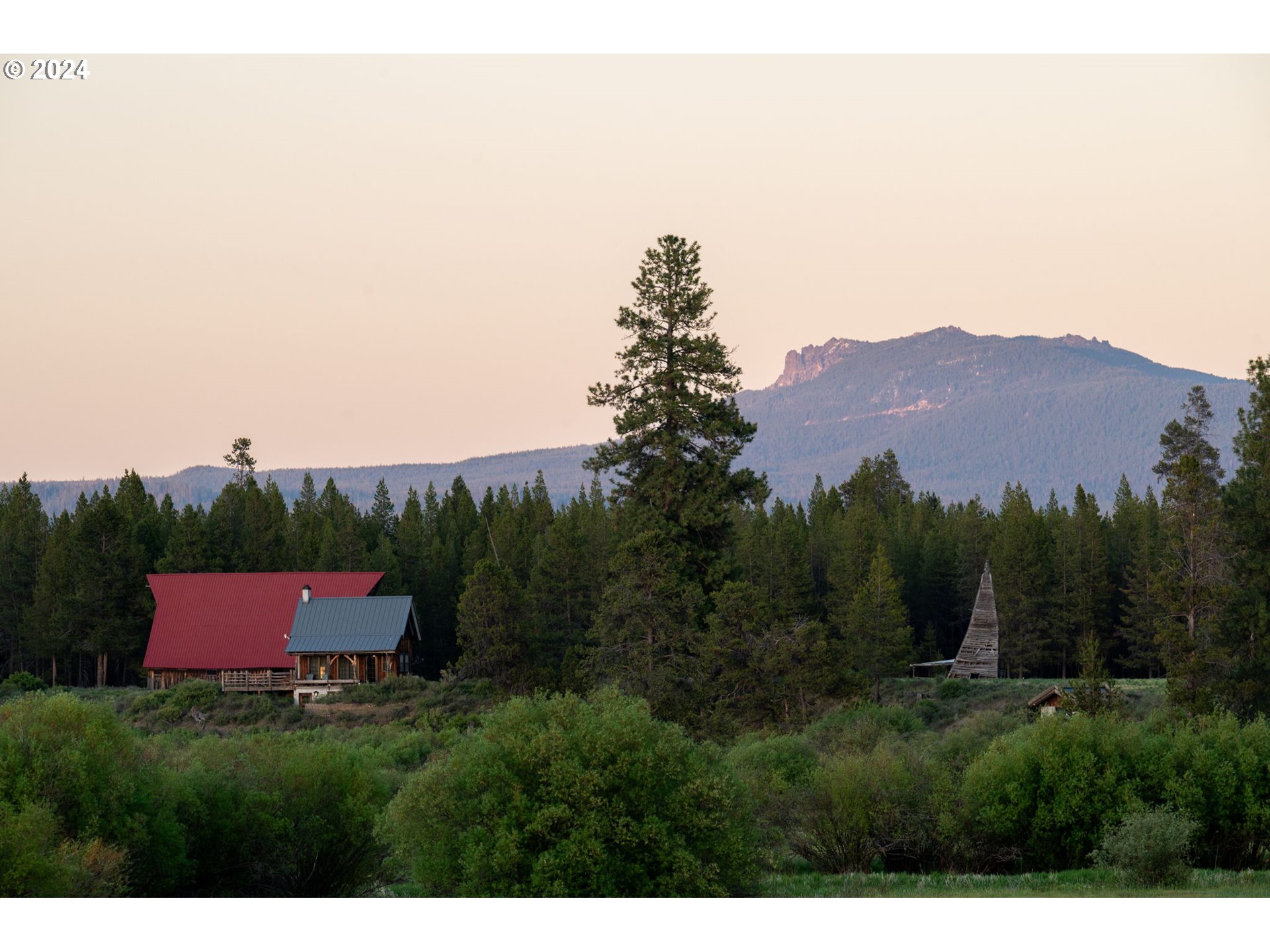 52255 Huntington Road La Pine, OR 97739 - Photo 44 of 48 a view of a lush green field