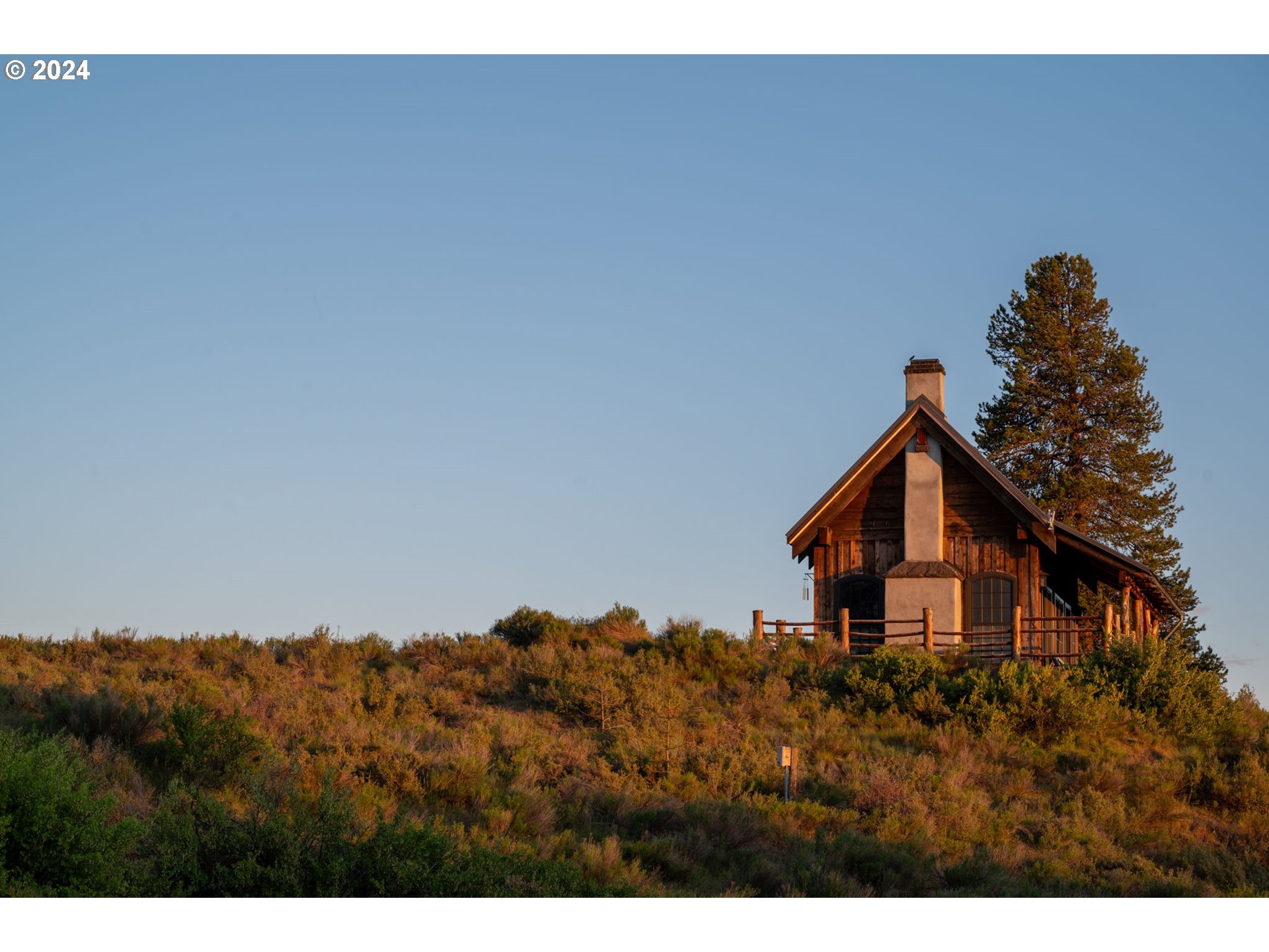 52255 Huntington Road La Pine, OR 97739 - Photo 45 of 48 a backyard of a house with lots of green space