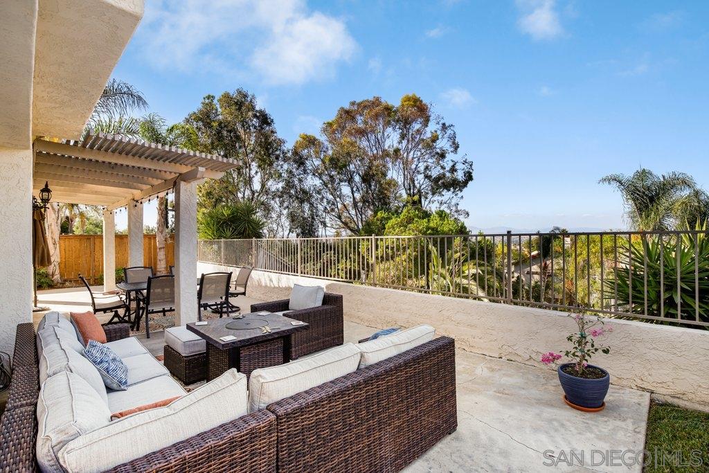 5058 Frazee Road Oceanside, CA 92057 - Photo 21 of 25 a view of a patio with couches and potted plants