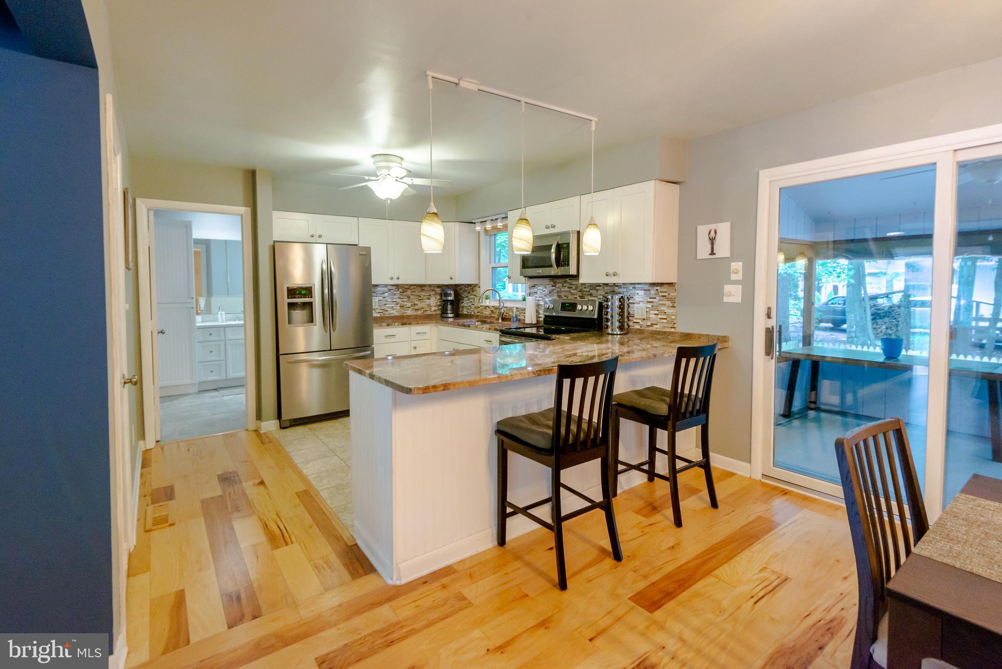 Open concept with remodeled SS Granite and Bar