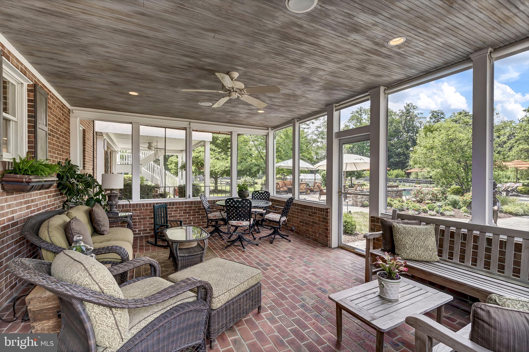 26100 Mullinix Mill Road Mount Airy, MD 21771 - Photo 54 of 99 Serene screened porch with lush views.