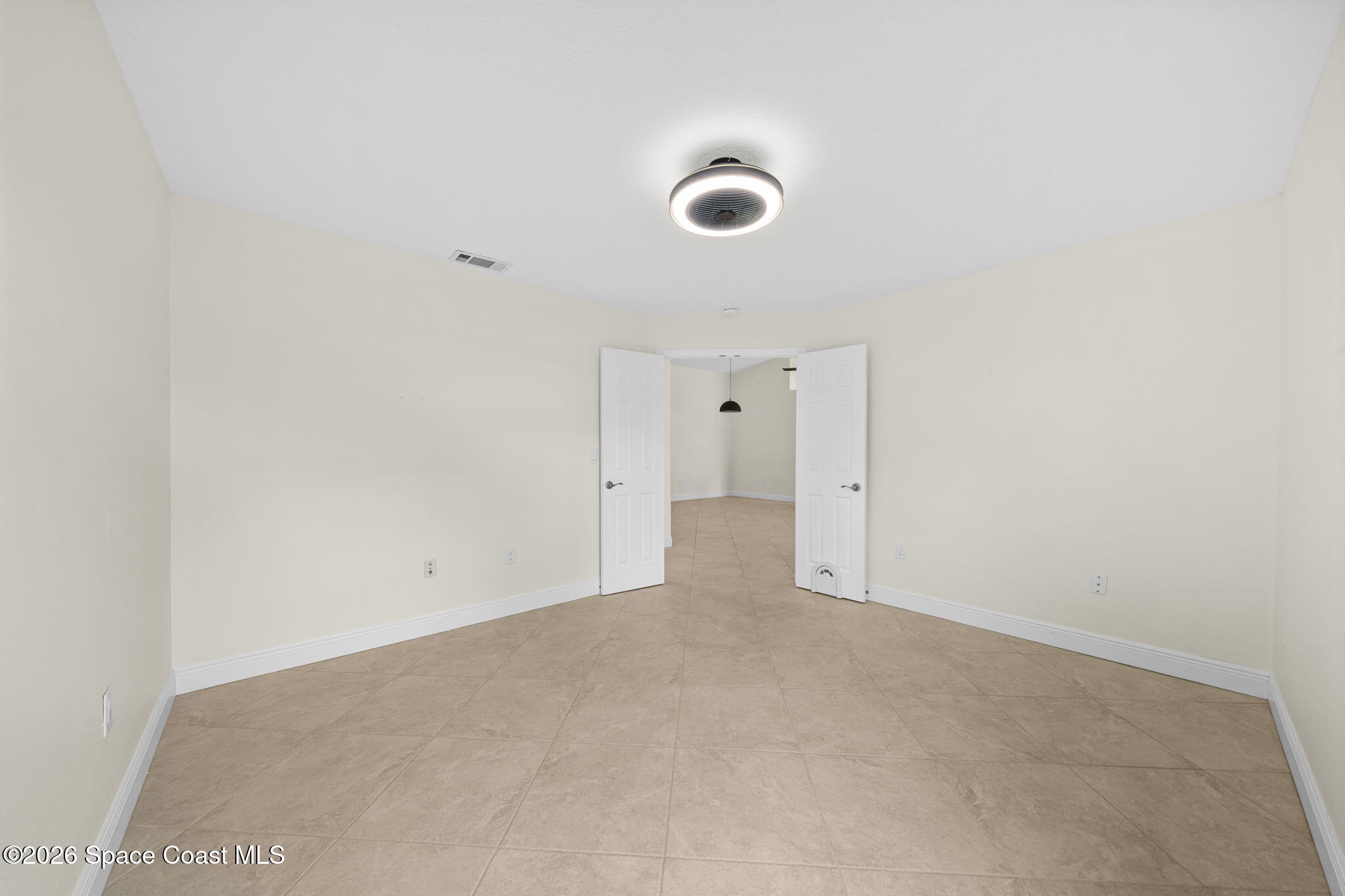 1236 Walnut Grove Way Rockledge, FL 32955 - Photo 15 of 43 a view of an empty room