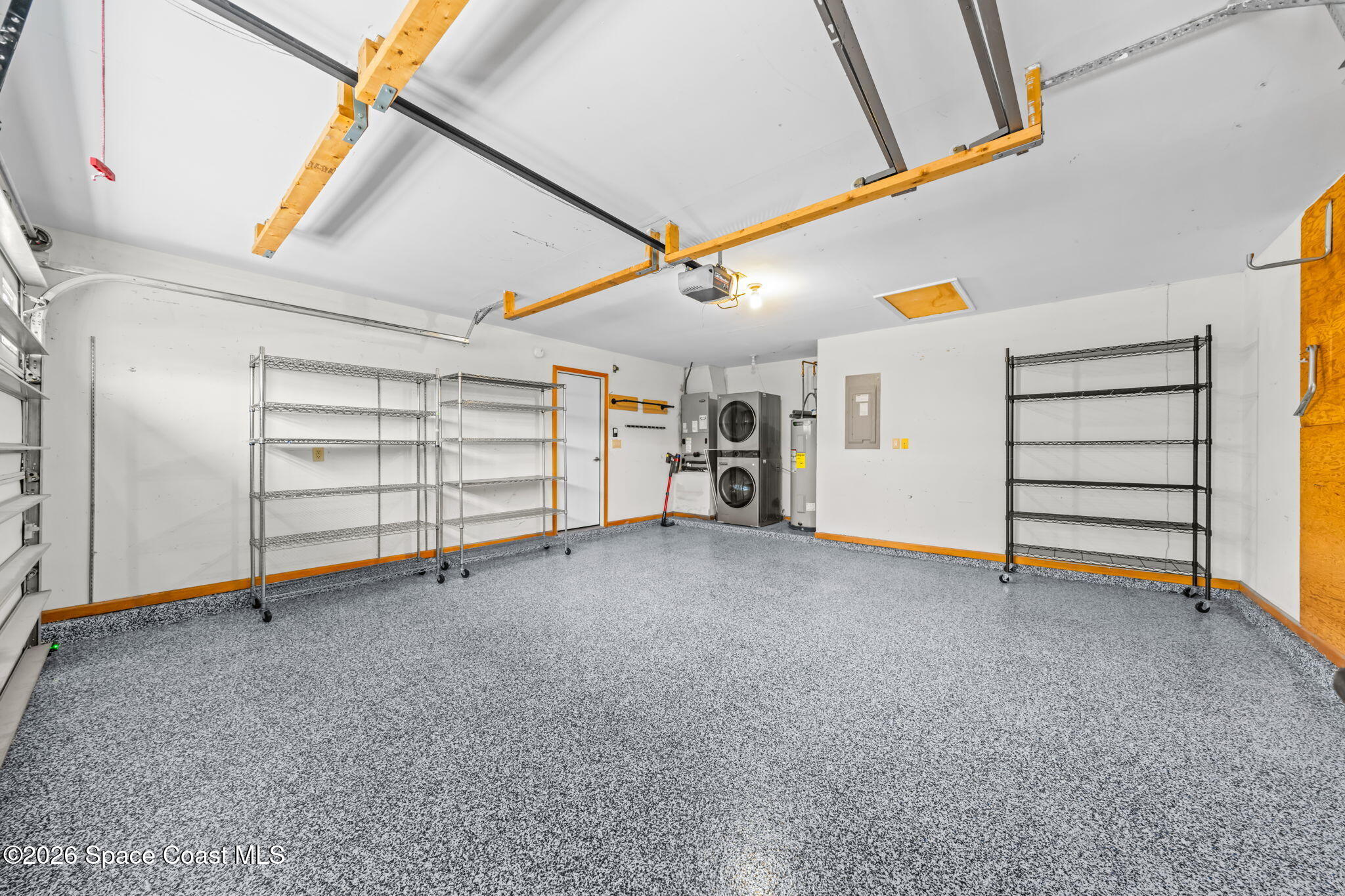 1236 Walnut Grove Way Rockledge, FL 32955 - Photo 26 of 43 a view of room with garage and stairs