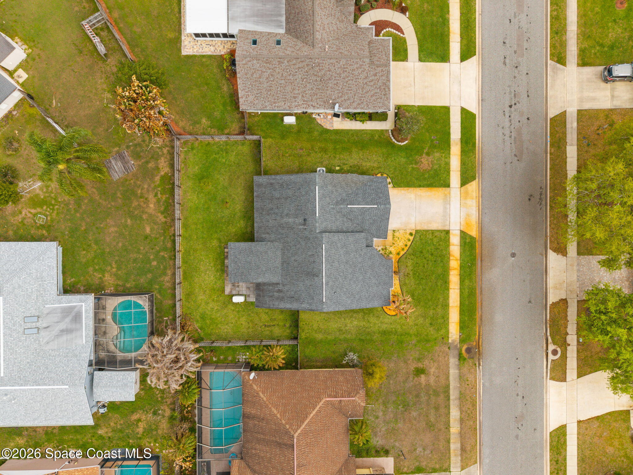 1236 Walnut Grove Way Rockledge, FL 32955 - Photo 32 of 43 aerial view of a house with a yard