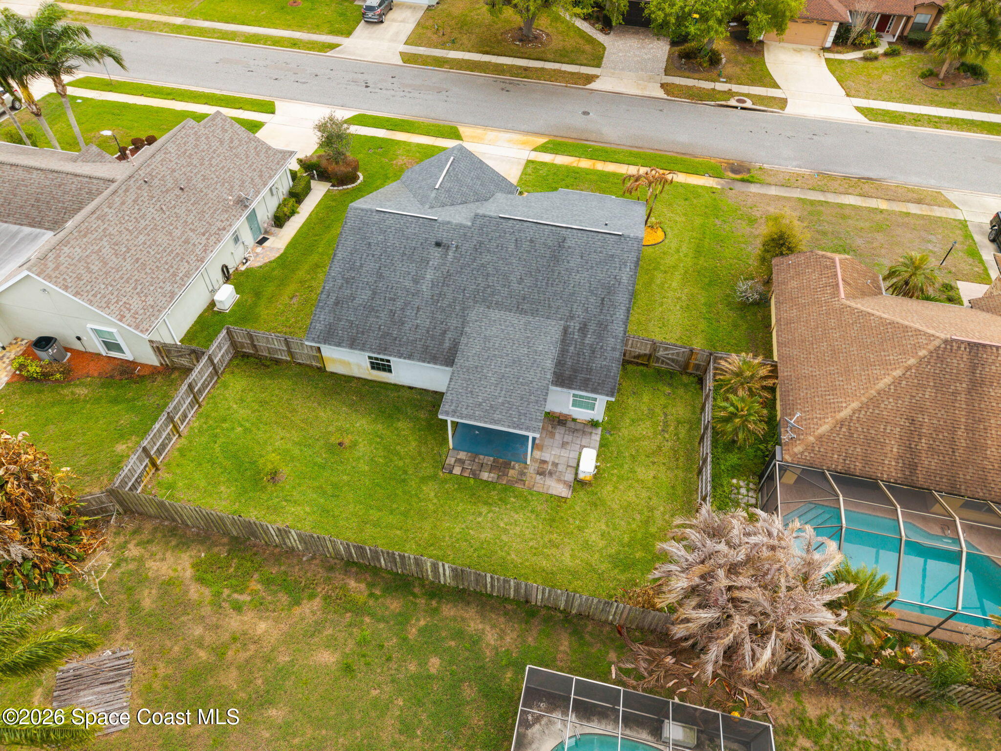 1236 Walnut Grove Way Rockledge, FL 32955 - Photo 33 of 43 a aerial view of a house with a swimming pool