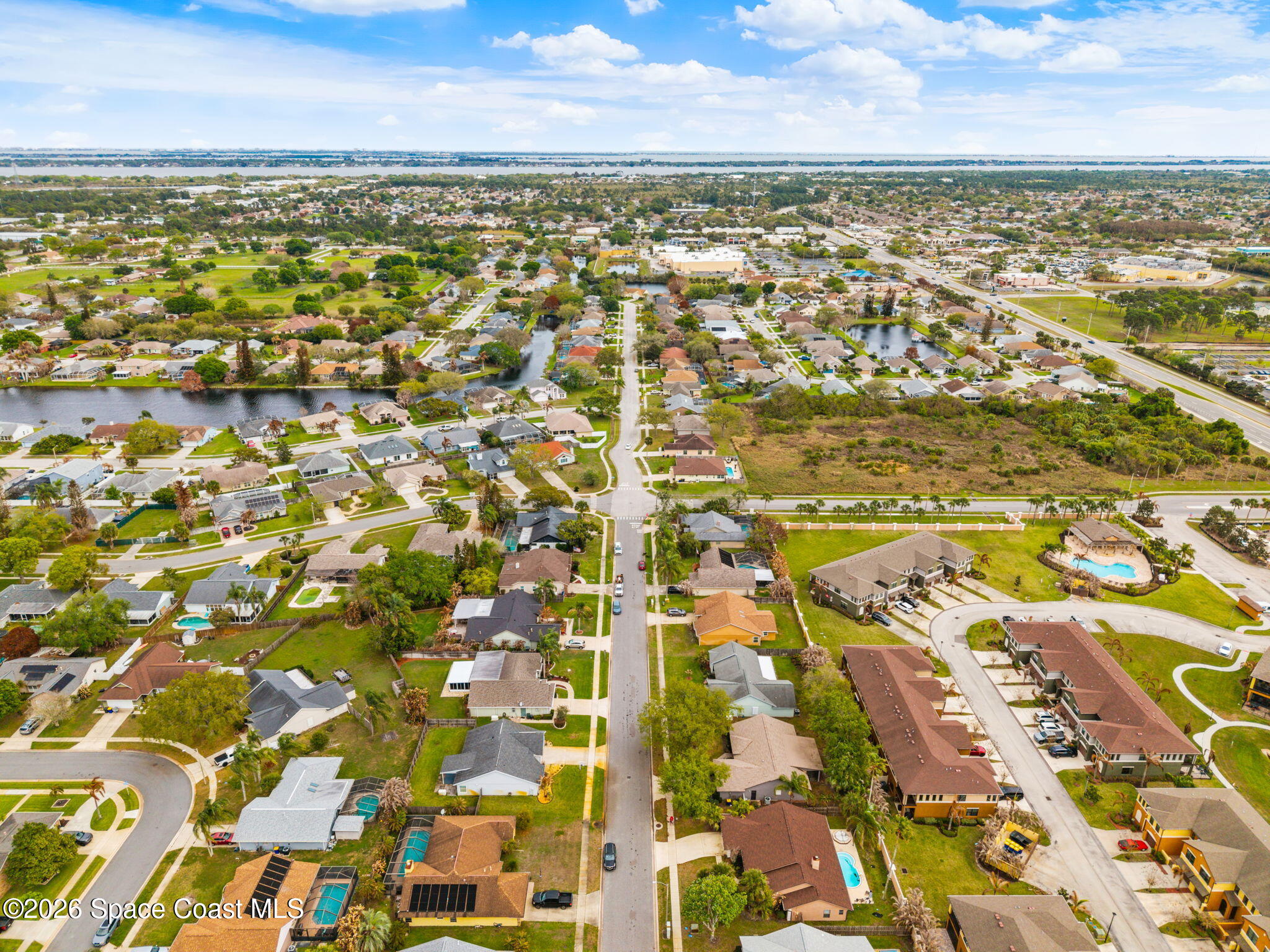 1236 Walnut Grove Way Rockledge, FL 32955 - Photo 35 of 43 an aerial view of residential building with parking space