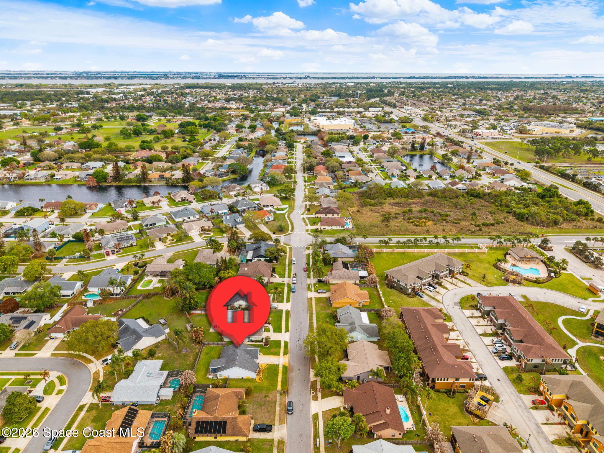 1236 Walnut Grove Way Rockledge, FL 32955 - Photo 38 of 43 an aerial view of residential houses with outdoor space