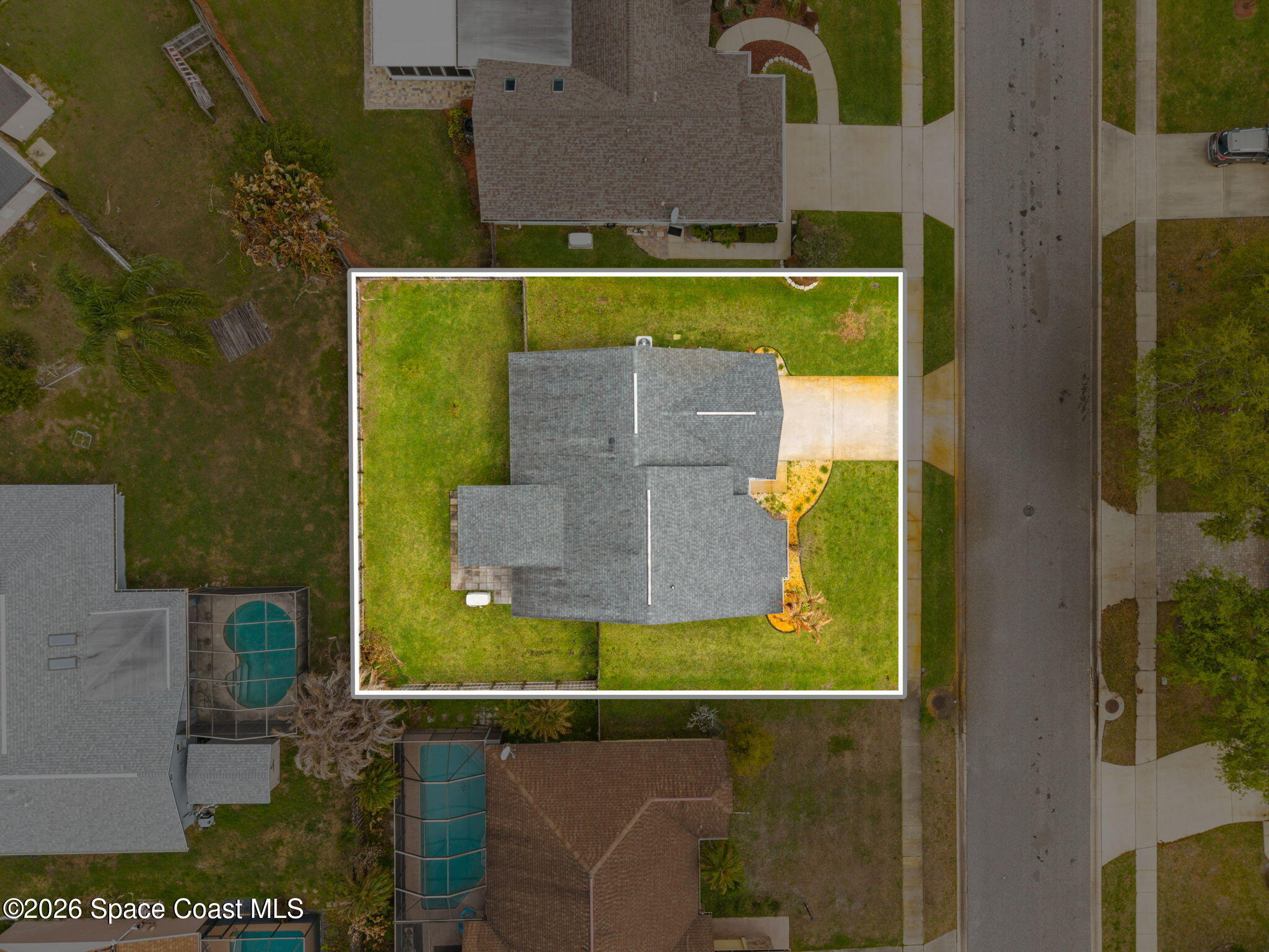 1236 Walnut Grove Way Rockledge, FL 32955 - Photo 39 of 43 an aerial view of a house with a yard