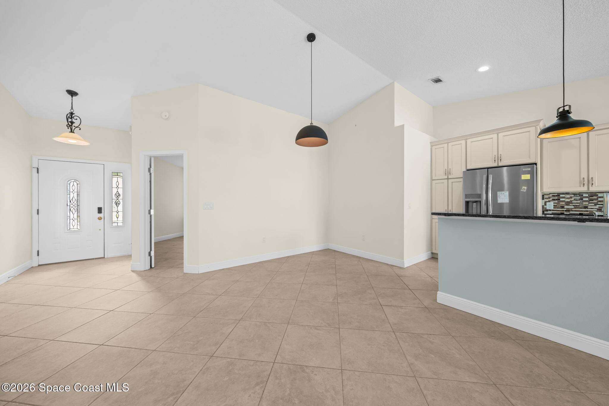 1236 Walnut Grove Way Rockledge, FL 32955 - Photo 6 of 43 a view of a kitchen with a sink and a window