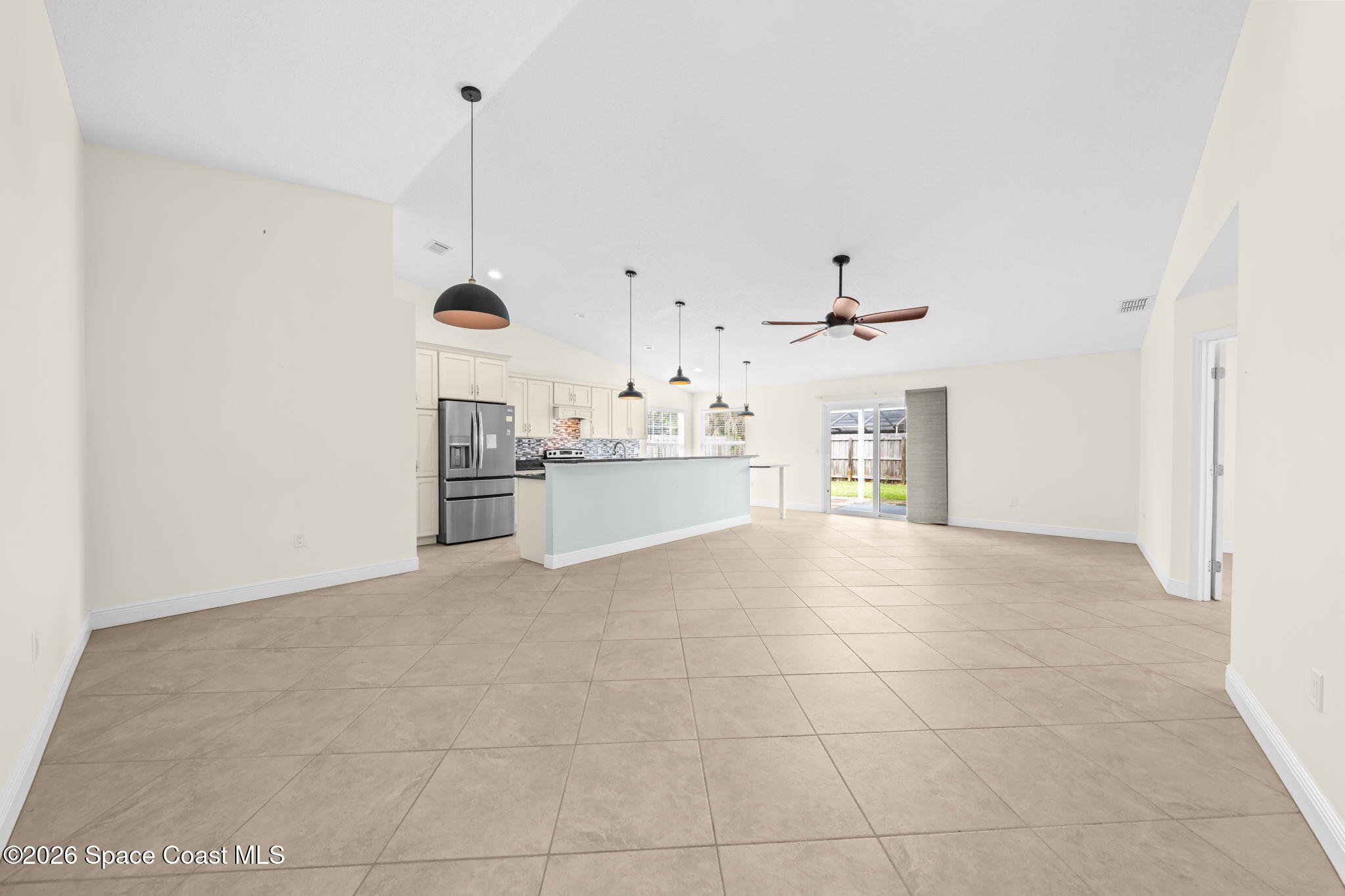 1236 Walnut Grove Way Rockledge, FL 32955 - Photo 7 of 43 a view of a kitchen with a sink and a window