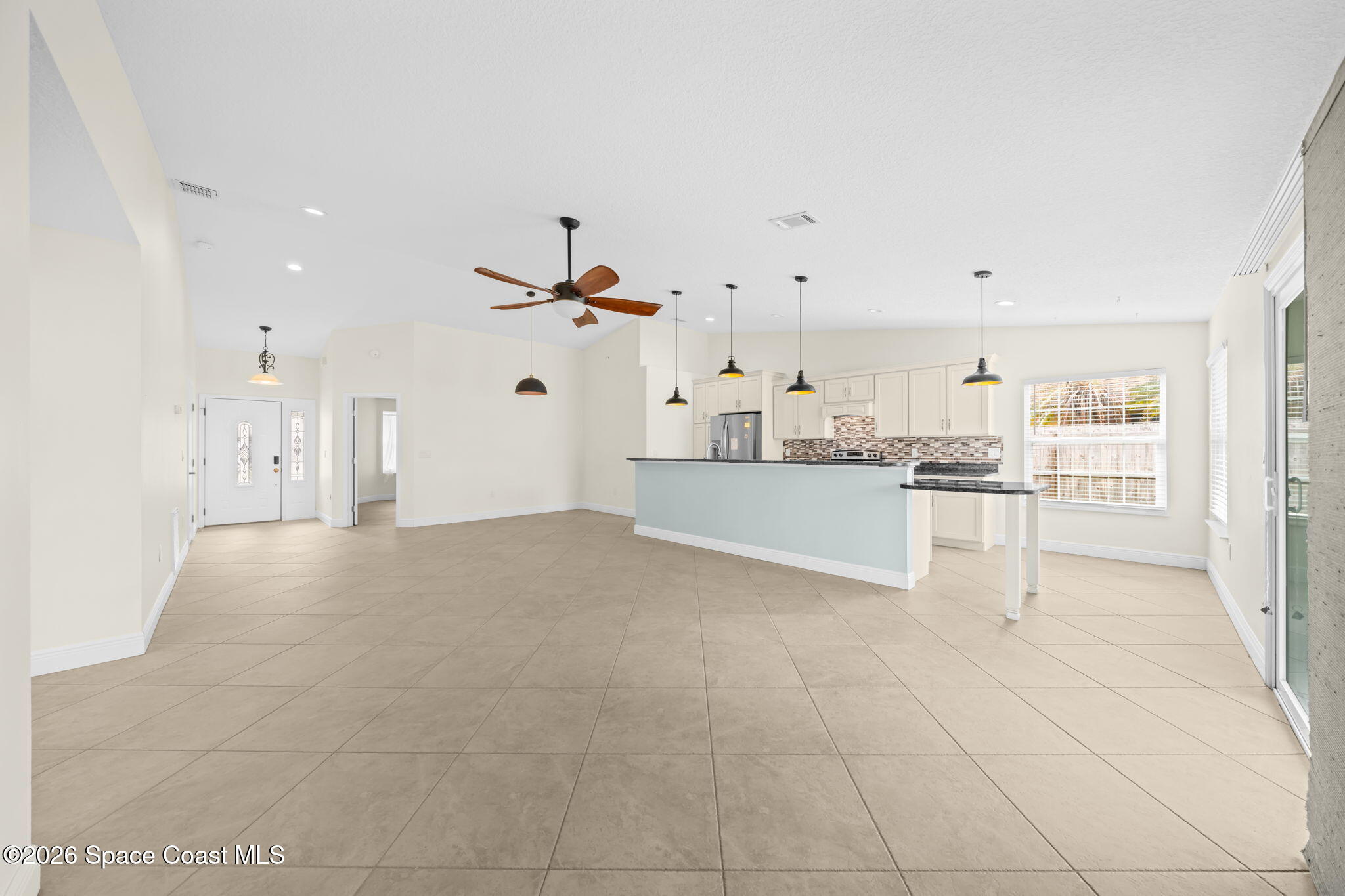 1236 Walnut Grove Way Rockledge, FL 32955 - Photo 9 of 43 a view of kitchen with white cabinets