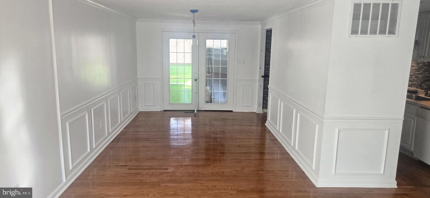 6311 Teaberry Way Clinton, MD 20735 - Photo 9 of 13 Bright and airy open space awaits.