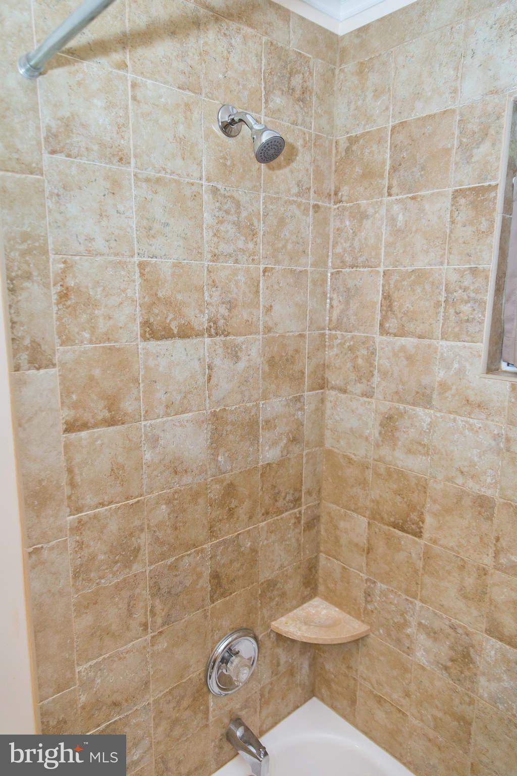 1012 Crosby Road Baltimore, MD 21228 - Photo 13 of 24 a bathroom with a sink and a toilet