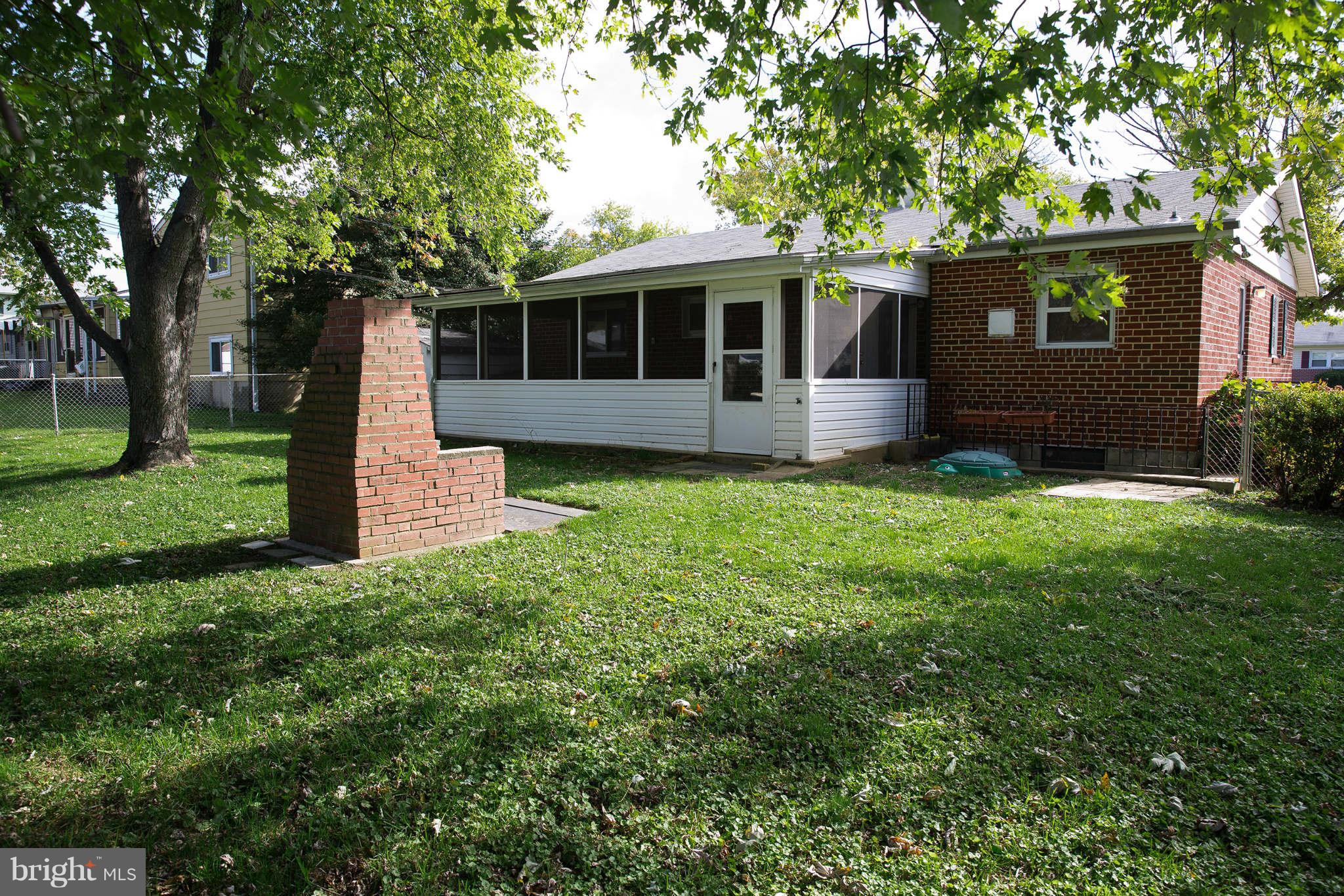 1012 Crosby Road Baltimore, MD 21228 - Photo 17 of 24 a front view of a house with garden