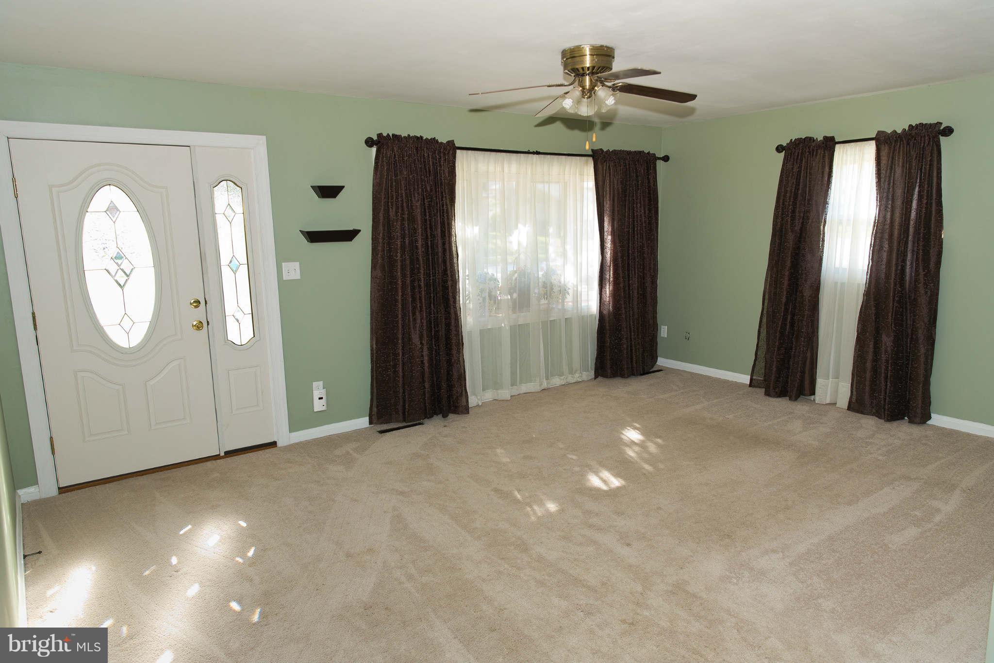 1012 Crosby Road Baltimore, MD 21228 - Photo 3 of 24 a view of livingroom with window