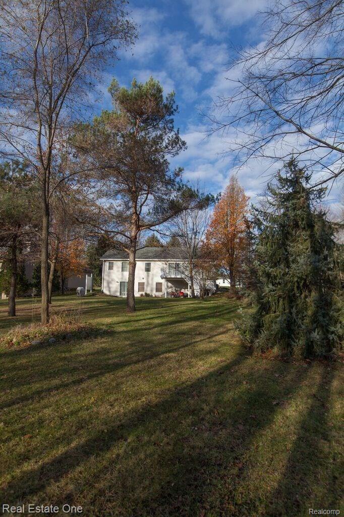 4360 Old Mill Road Pinckney, MI 48169 - Photo 25 of 28 Rear Elevation.jpg