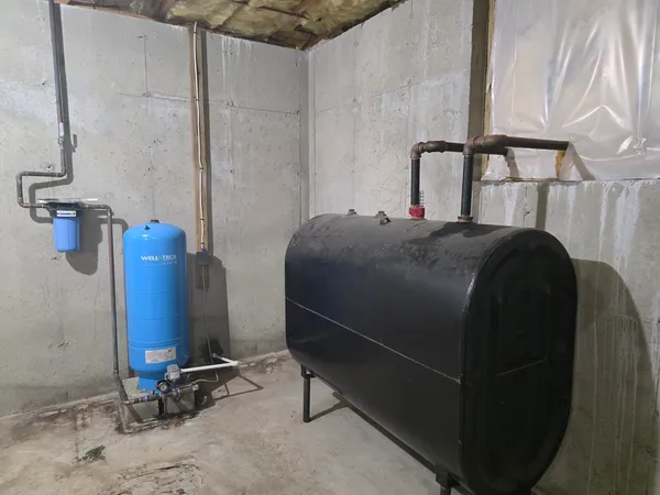 a bedroom with a bed and cabinets